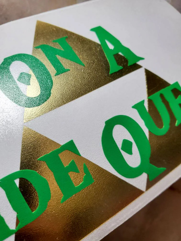 On A Side Quest Decal with Brushed Metallic Gold Vinyl 6"