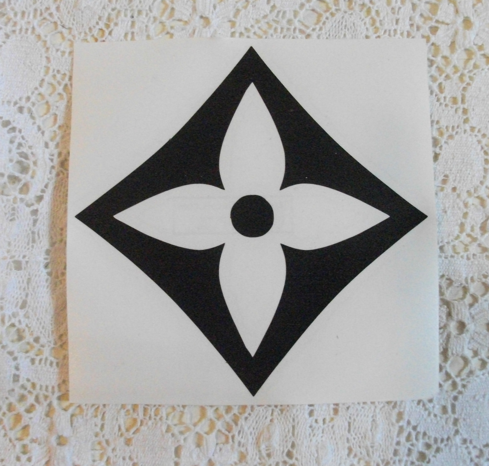 FLOWER DECAL black on clear 4" tall designer decorator Interior use