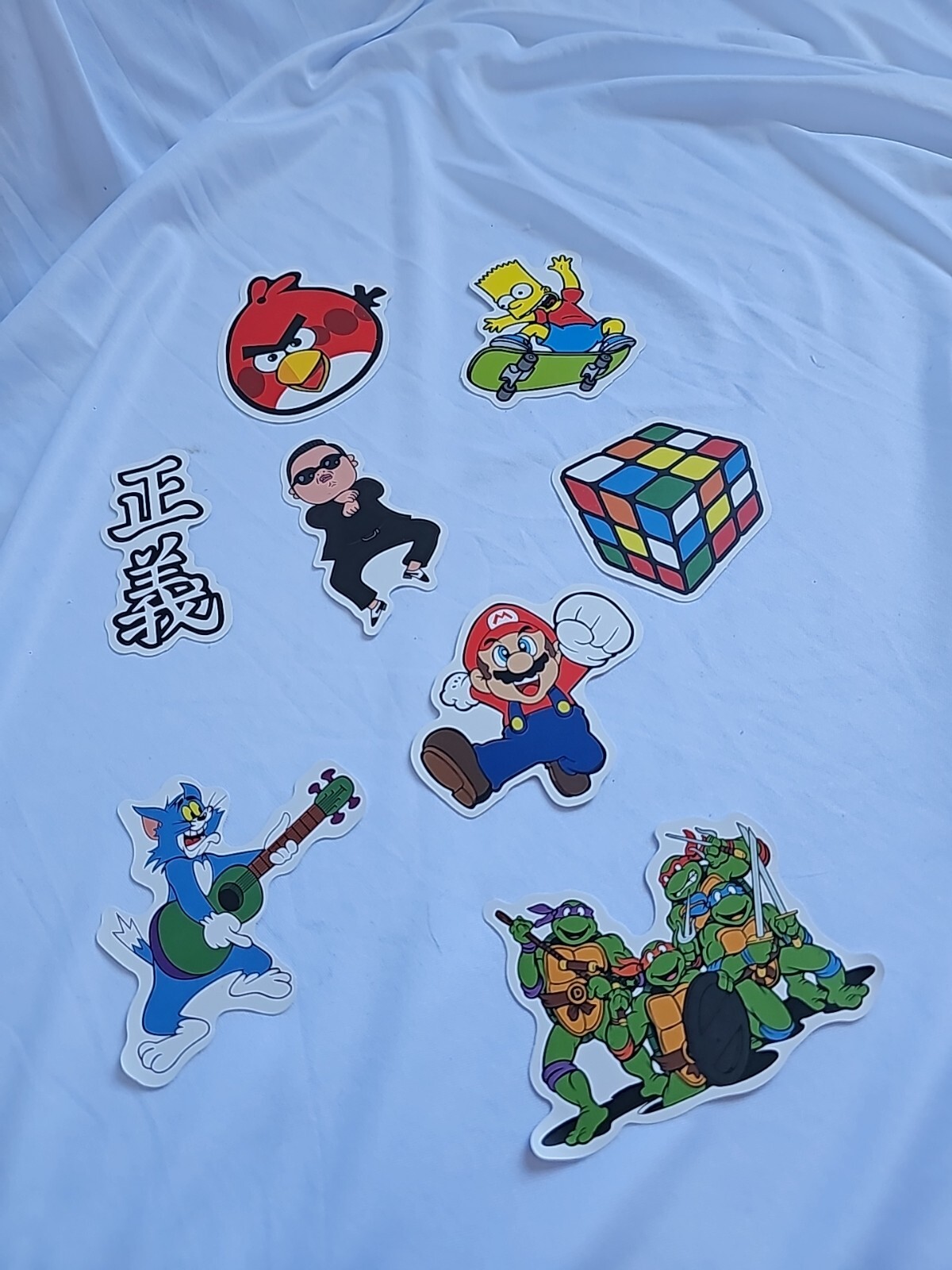 8 stickers Angry Birds Simpsons TMNT Mario Rubics Cube Tom Gangnam 1-3"