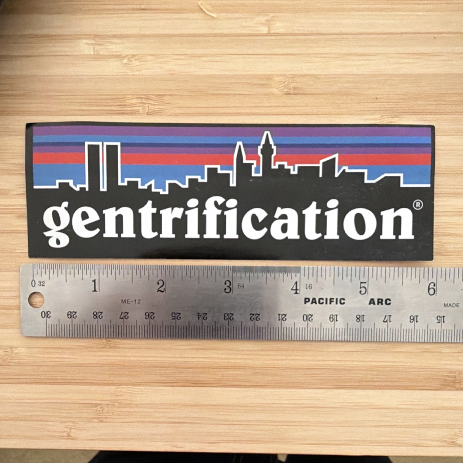 “Gentrification” City Skyline Vinyl Sticker Black White Blue Red Purple 6x2in