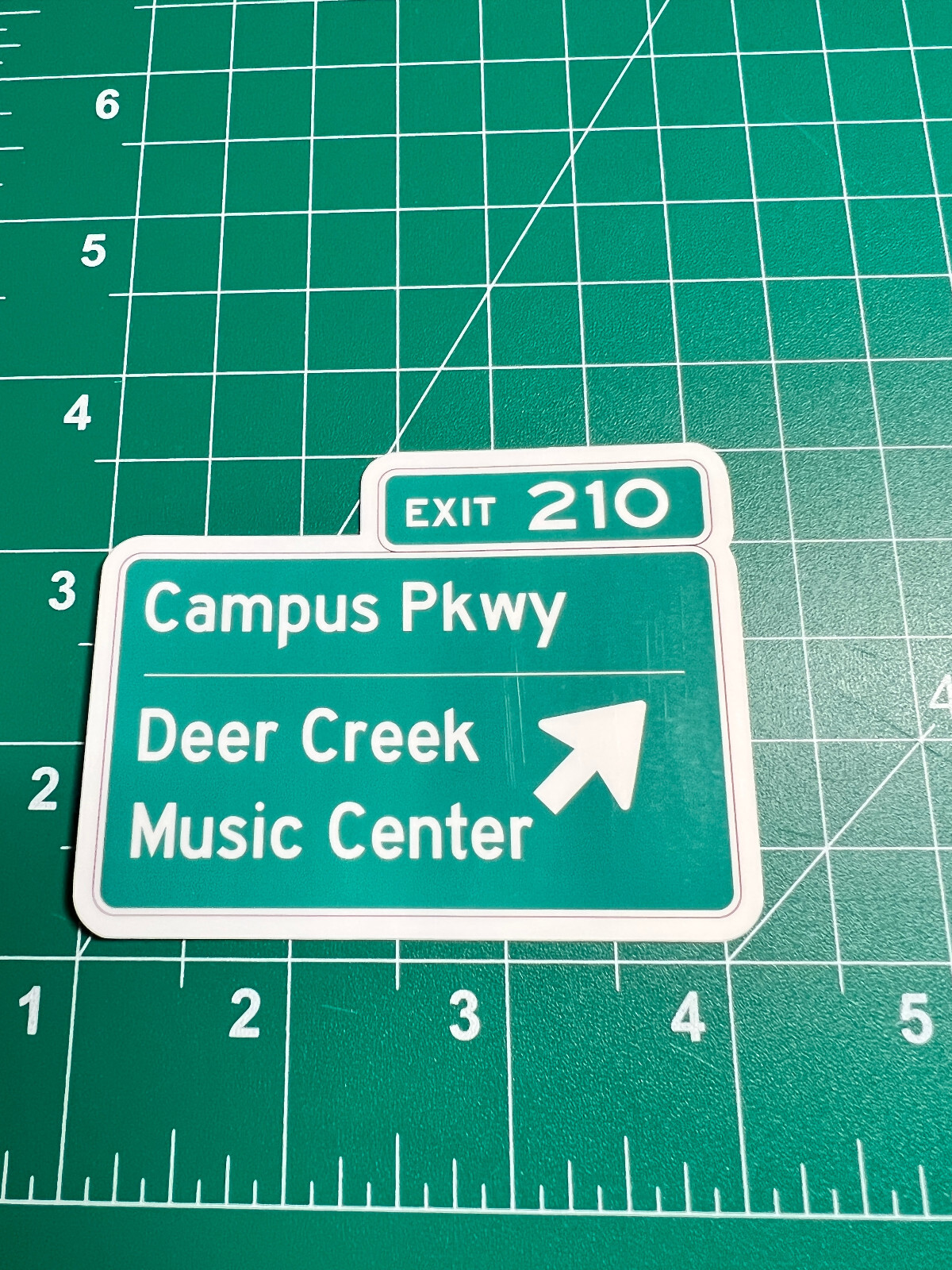Deer Creek Music Center Road Sign – Laminated Vinyl Sticker – 2.5"x3"