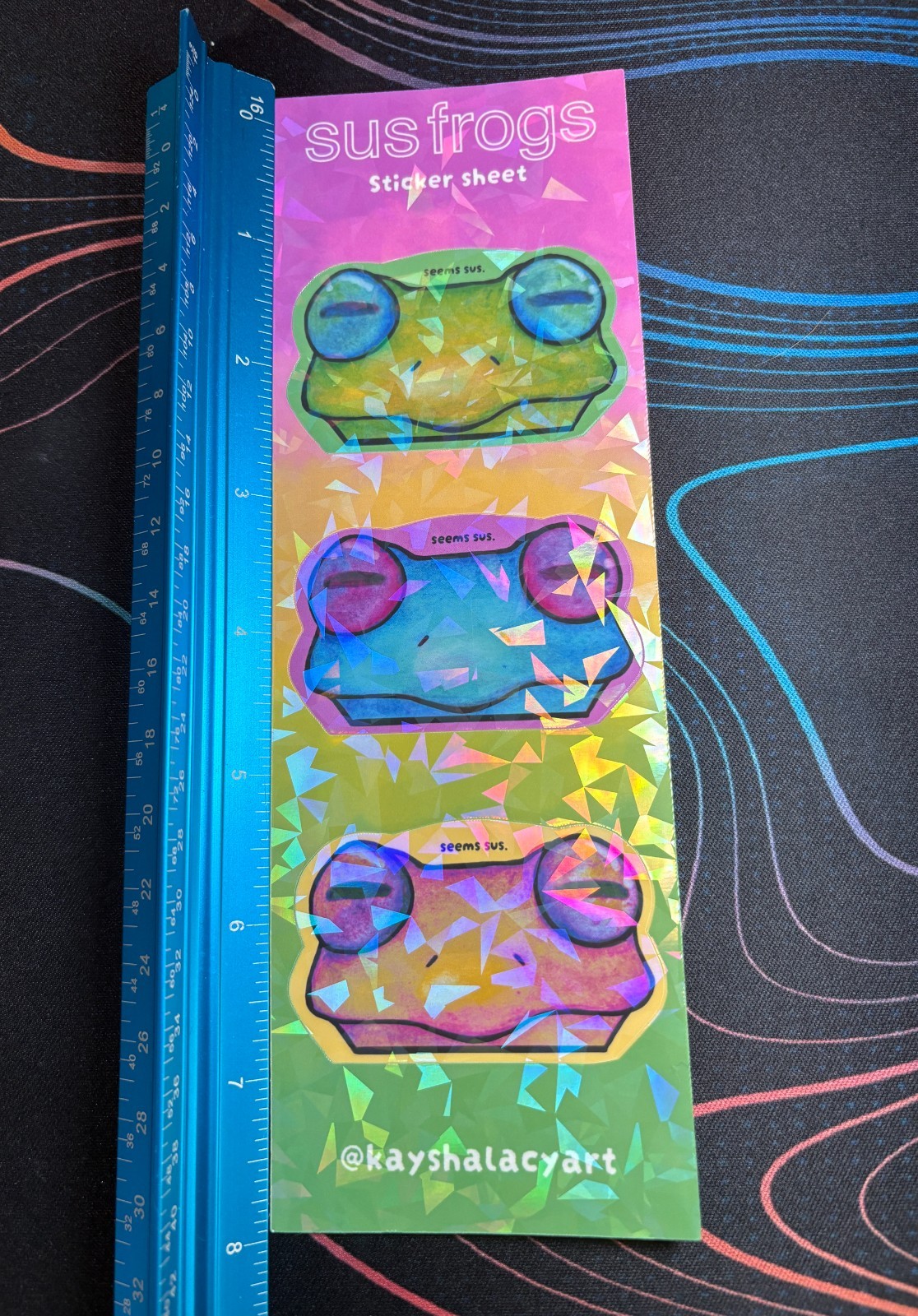 Seems Sus Frogs Holographic Waterproof Vinyl Sticker Sheet by KayshaLacyArt