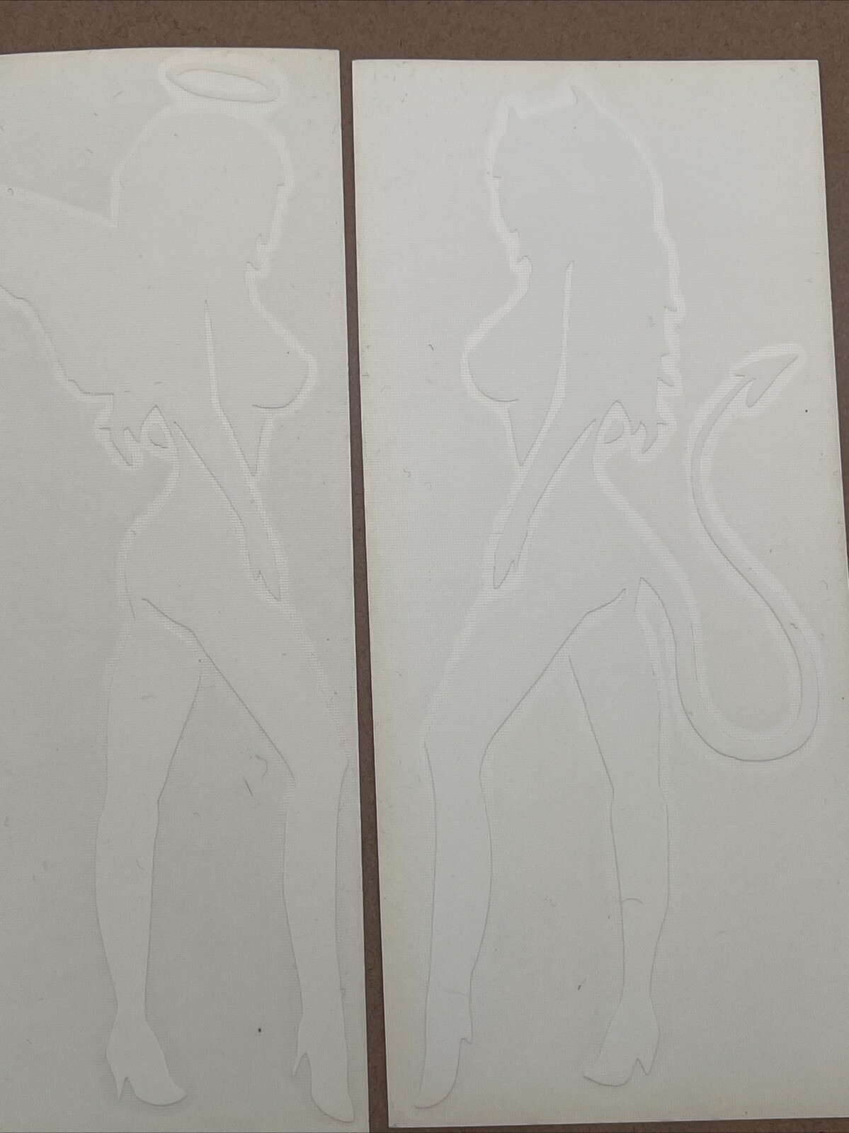 Set Of 2 Devil & Angel Girls white Vinyl Decal: 8” X 3”, Not For Porous Surfaces