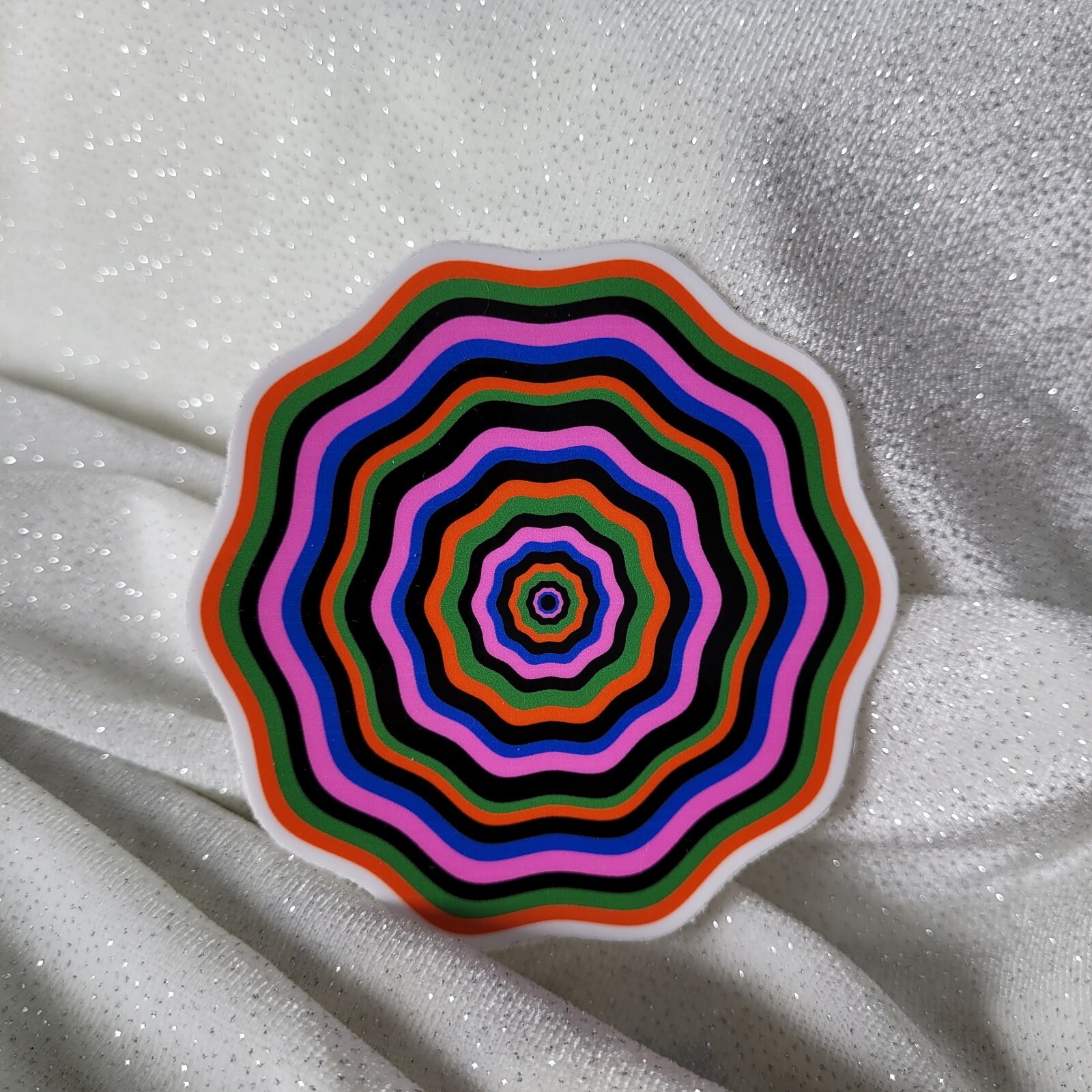 STKR084 Twisted Orange Green Pink Blue Seventies FLOWER Shaped Sticker Illusion