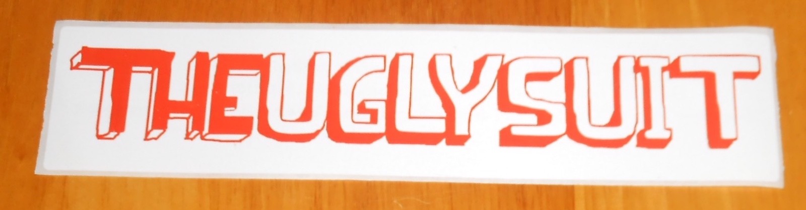 The Ugly Suit Bumper Sticker Original Promo 7.5×1.75