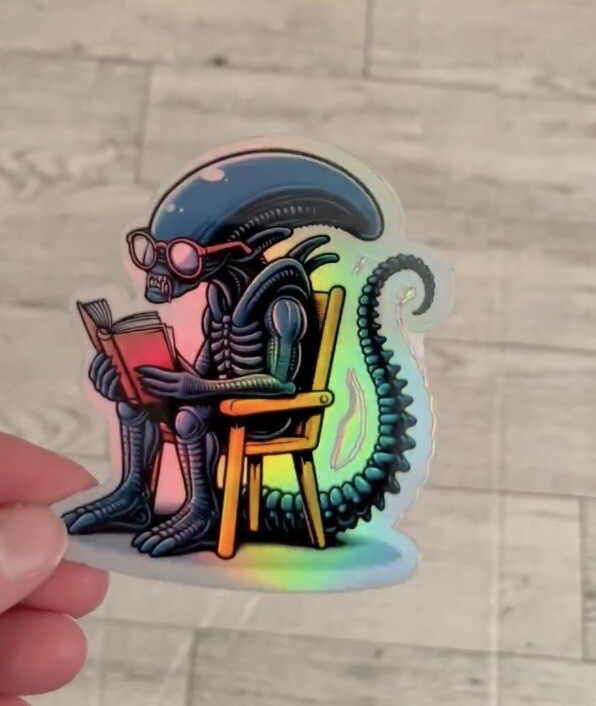 Alien Xenonorph Reading Book 3inch Holographic Waterproof sticker