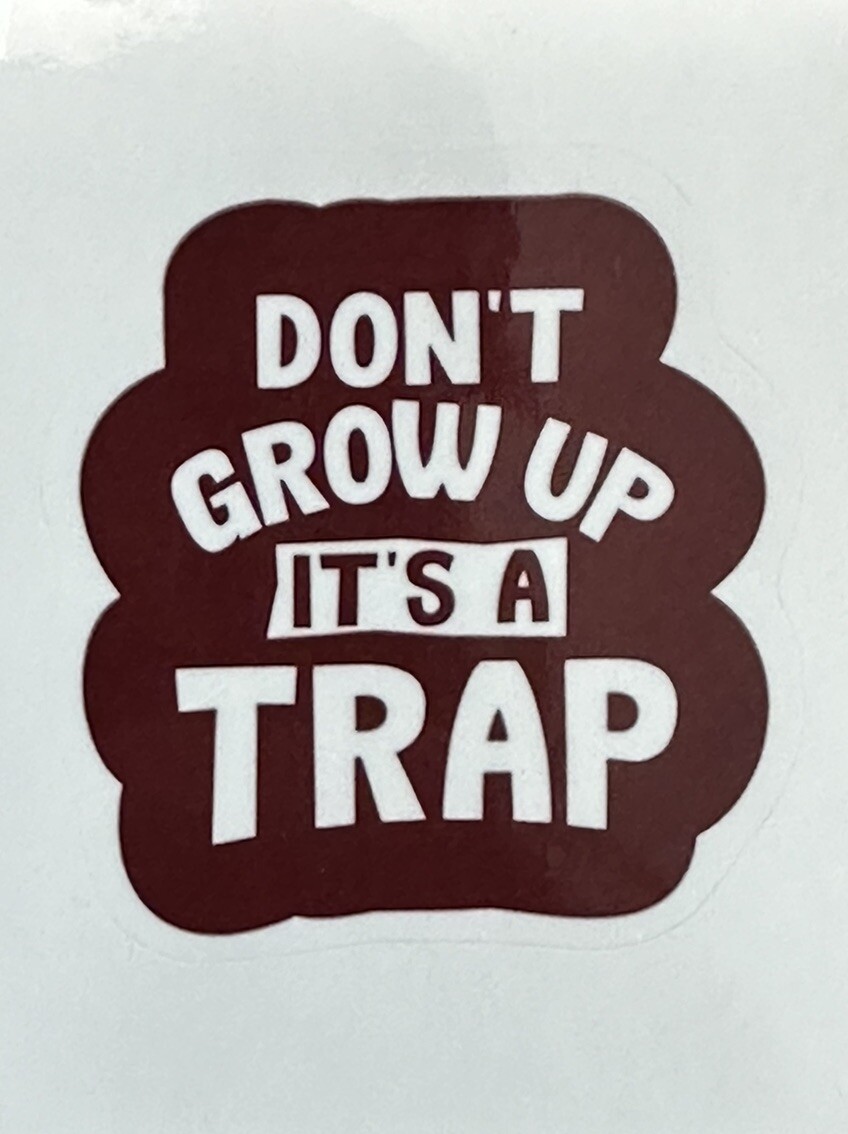 DON'T GROW UP IT'S A TRAP ~ Small Vinyl Sticker – 1.5 in