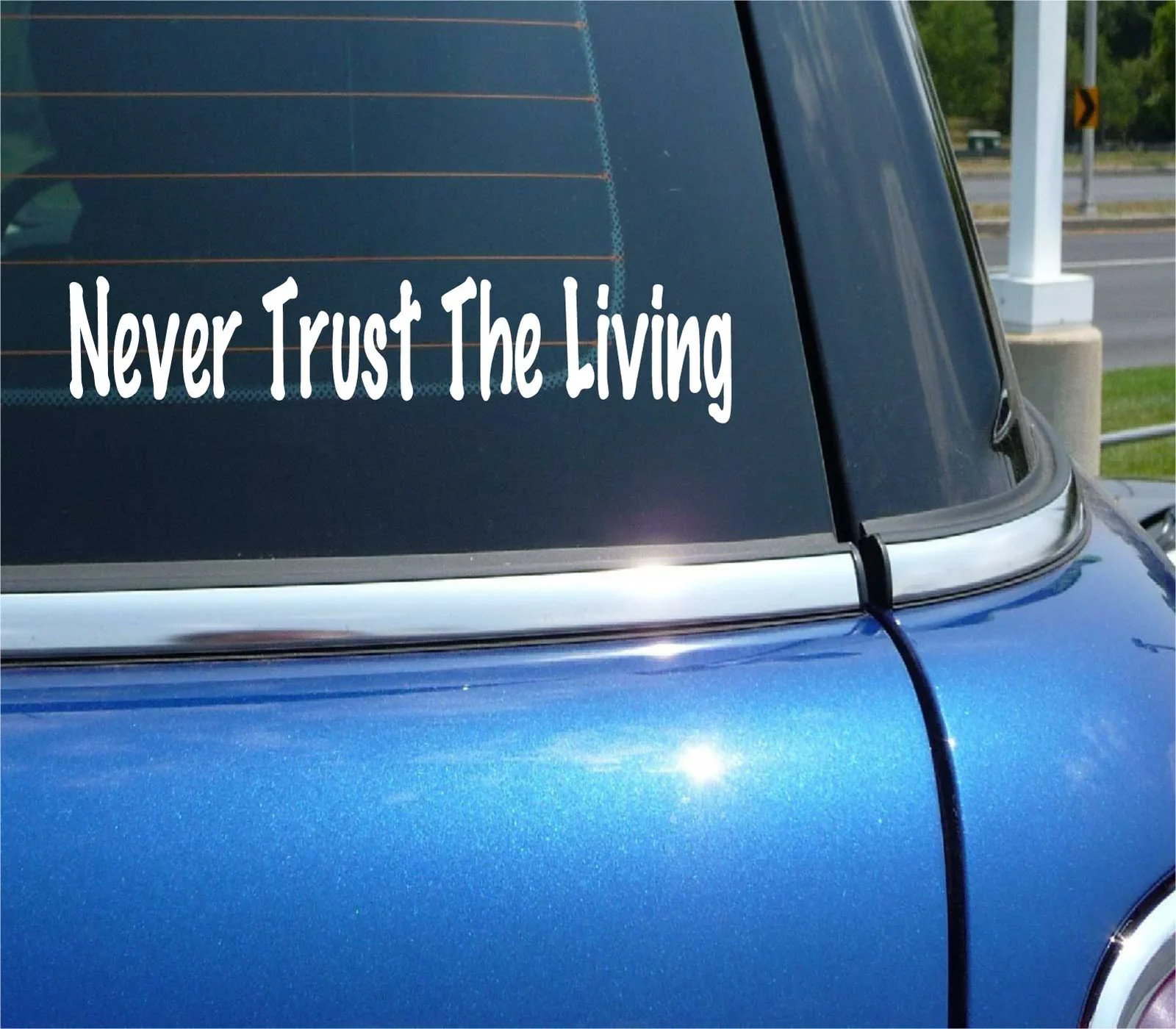 NEVER TRUST THE LIVING DECAL STICKER FUNNY HALLOWEEN DEAD ZOMBIE CAR TRUCK