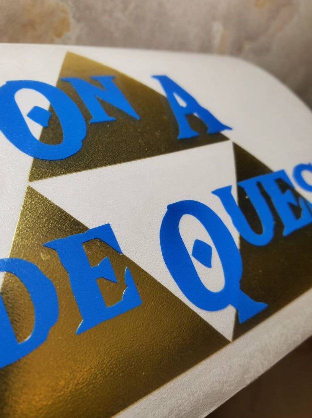On A Side Quest Decal with Brushed Metallic Gold Vinyl 6"