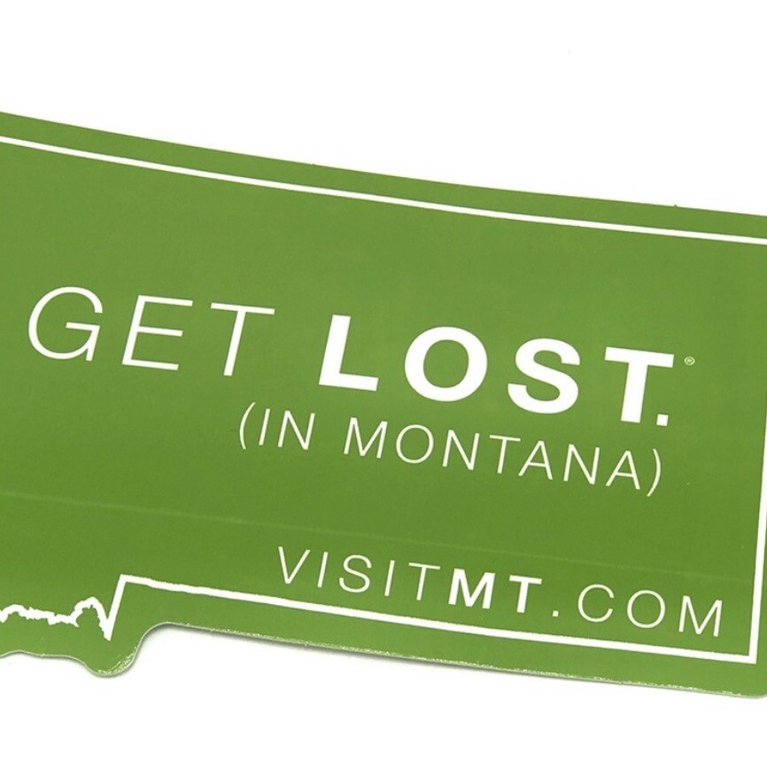 Get Lost In Montana Bumper Sticker Decal Green Montana Shaped Travel Souvenir RV