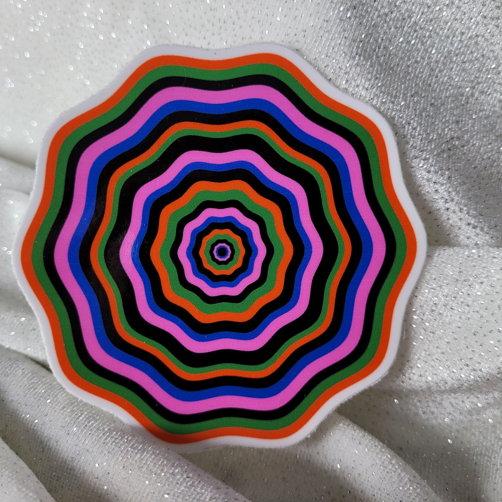 STKR084 Twisted Orange Green Pink Blue Seventies FLOWER Shaped Sticker Illusion