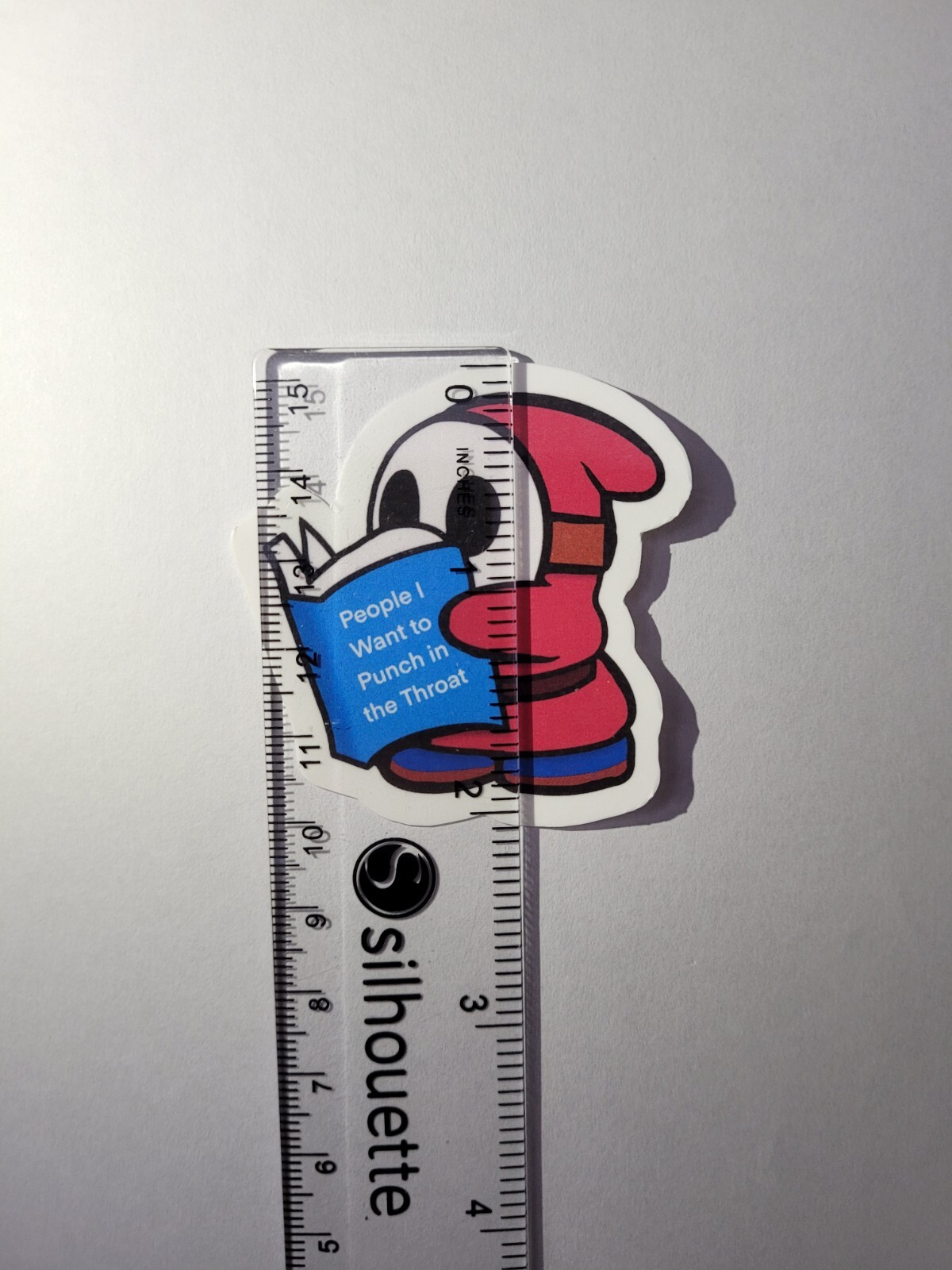 Laminated, Water Resistant, Shy Guy Reading A Book Sticker