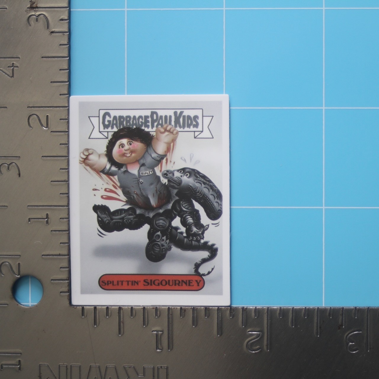 Garbage Pail Kids Sticker (SPLITTIN' SIGOURNEY) GPK Aliens Film, Gloss PVC Decal