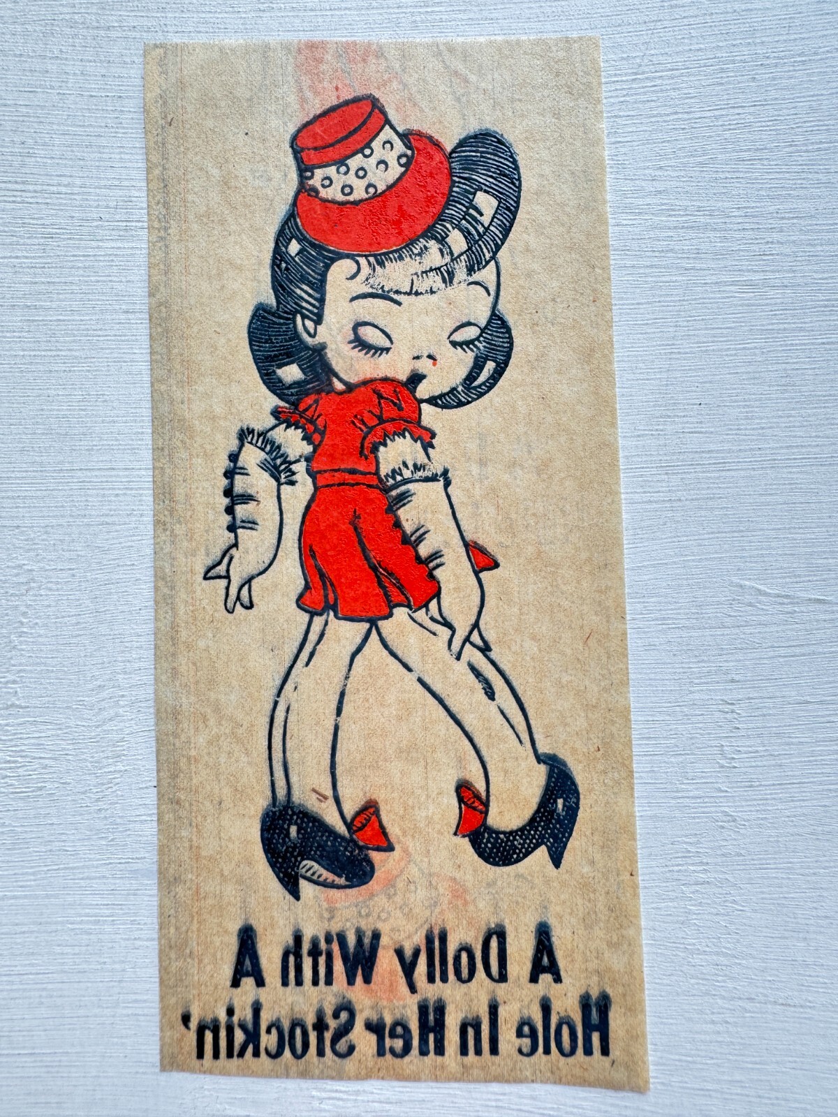 1940's Clothing Iron on Decal of A Dolly With A Hole In Her Stockin'