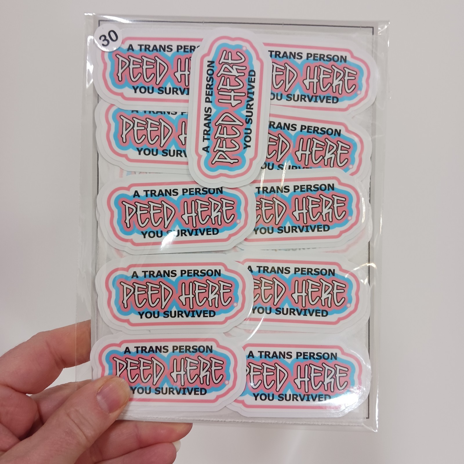 A Trans Person Peed Here – You Survived – Premium Waterproof Vinyl Stickers