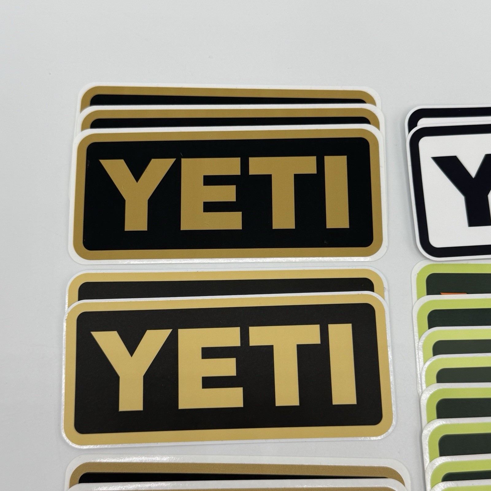 YETI Logo Stickers Decals Lot of 24 – Assorted Colors Tan Orange Black