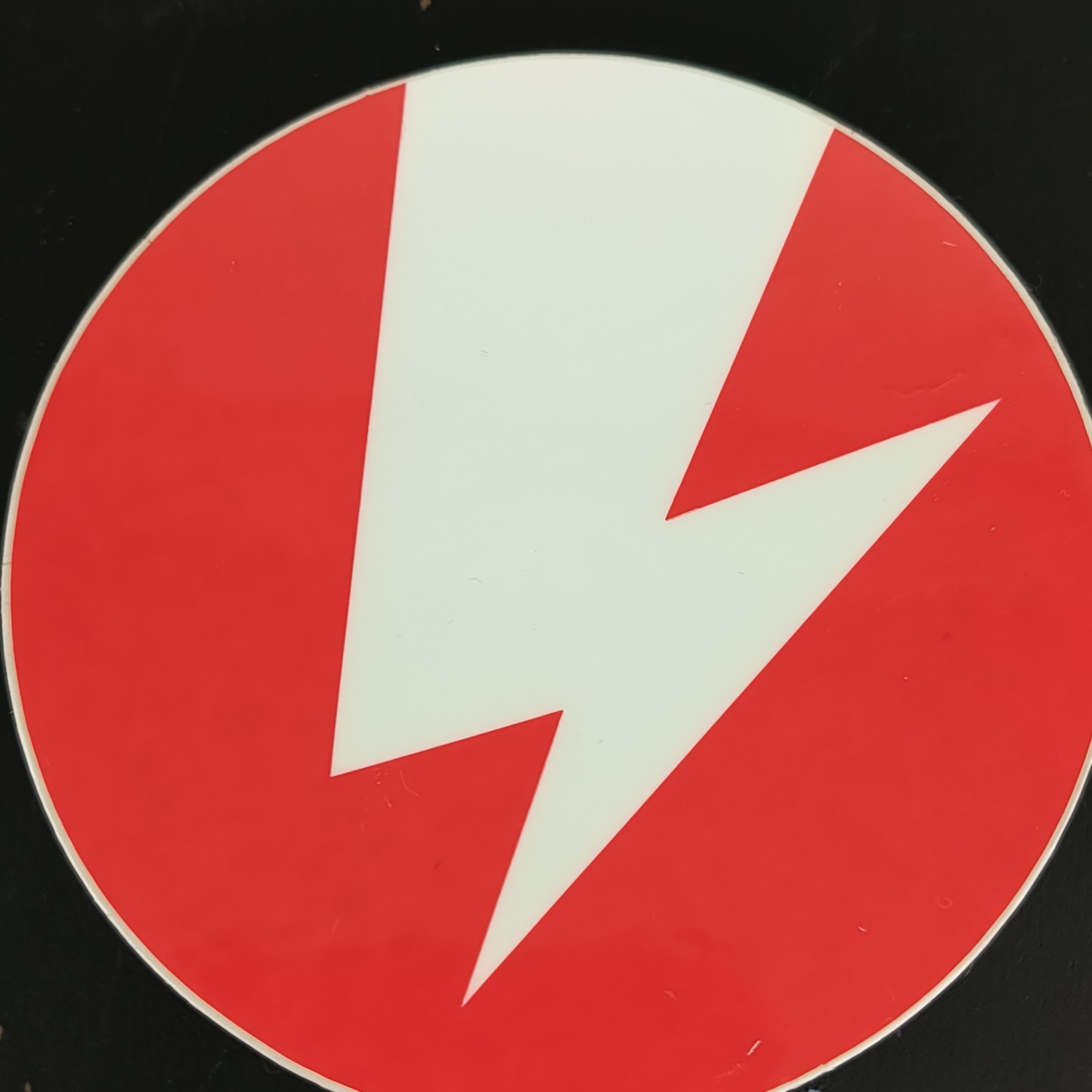 Unknown Lightning Bolt Decal Sticker White Bolt with Red Background Round 3 In