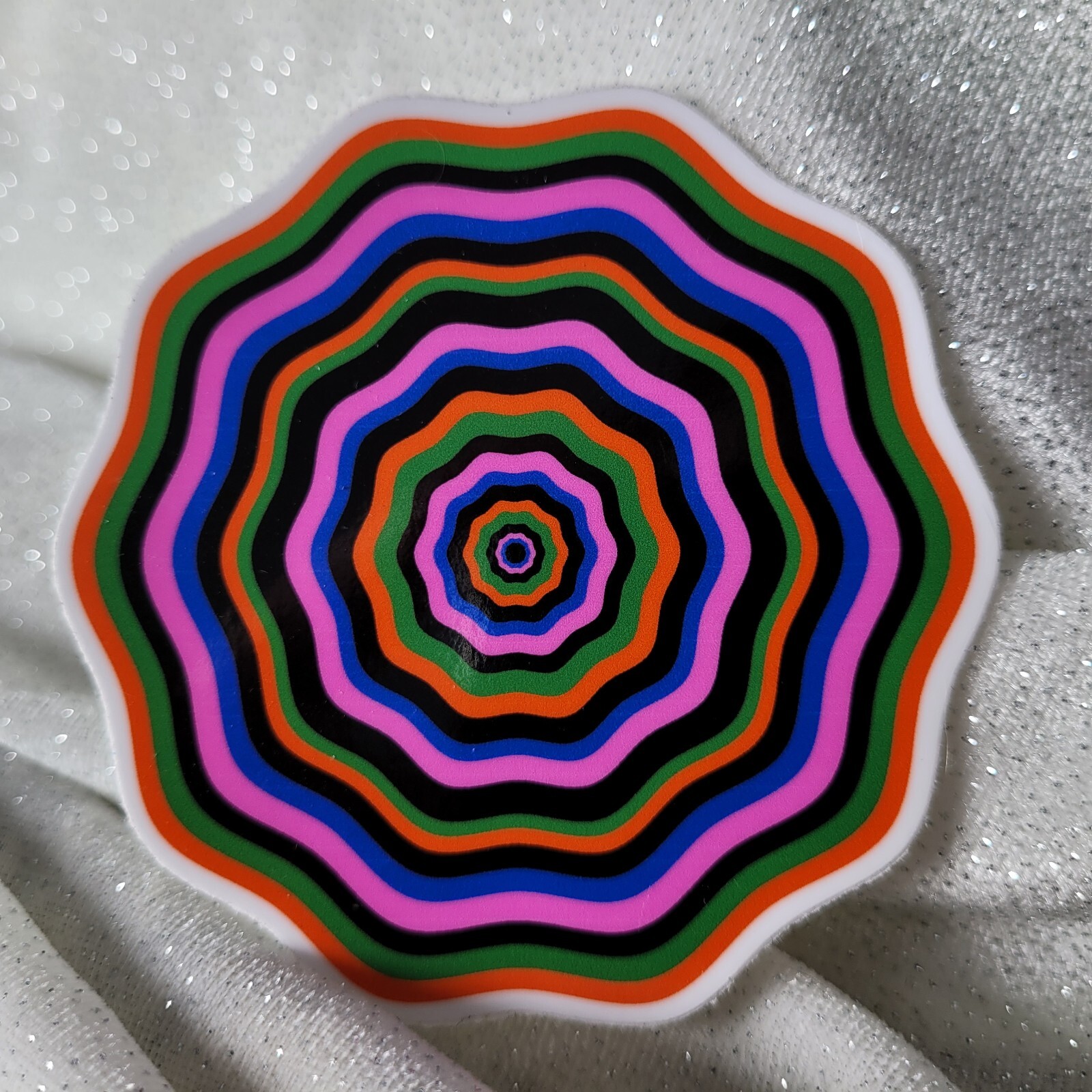 STKR084 Twisted Orange Green Pink Blue Seventies FLOWER Shaped Sticker Illusion