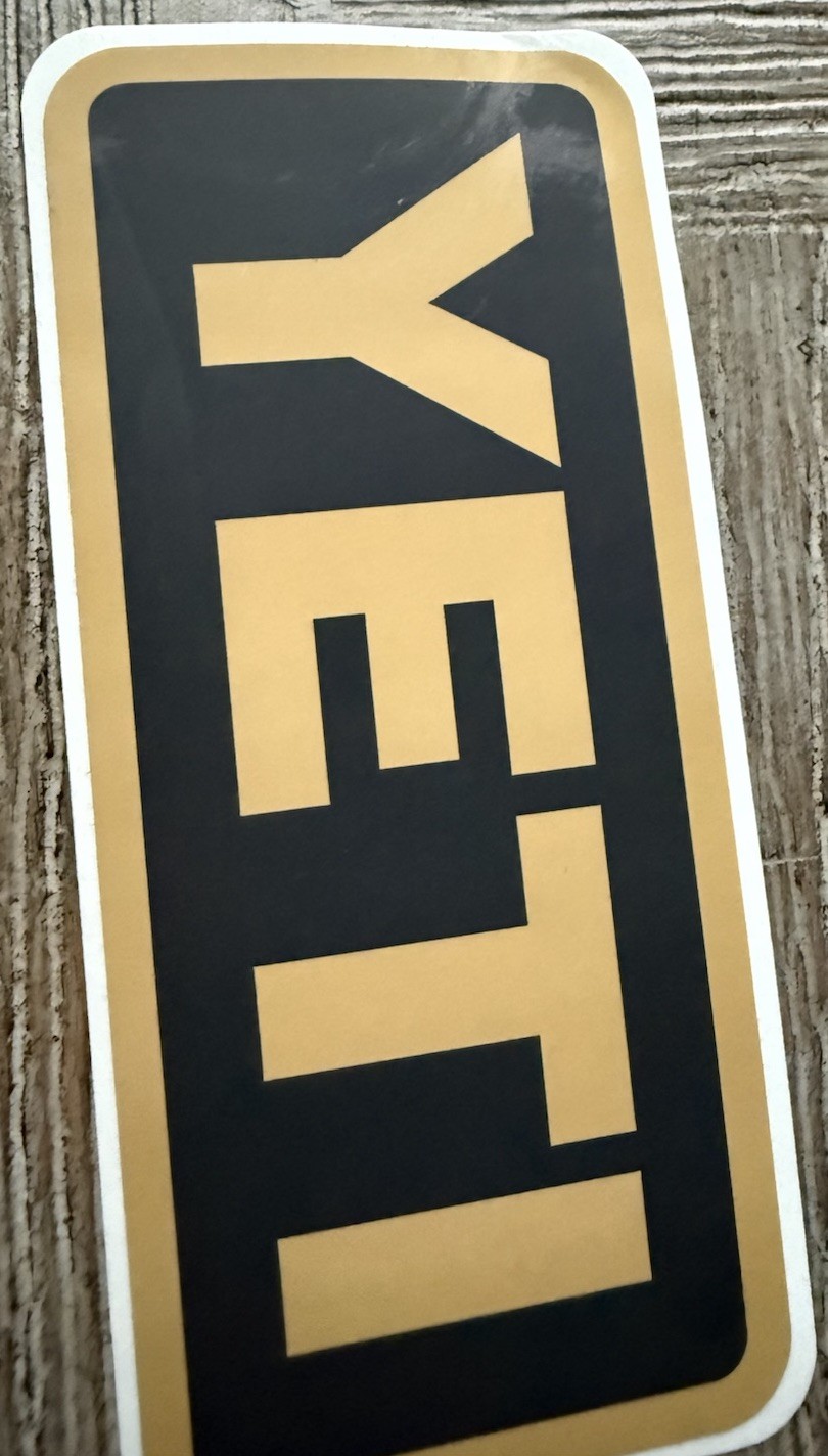 YETI AUTHENTIC STICKER – BLACK AND GOLD Decal Cooler Mug Tumbler Car WoW VISIT!!