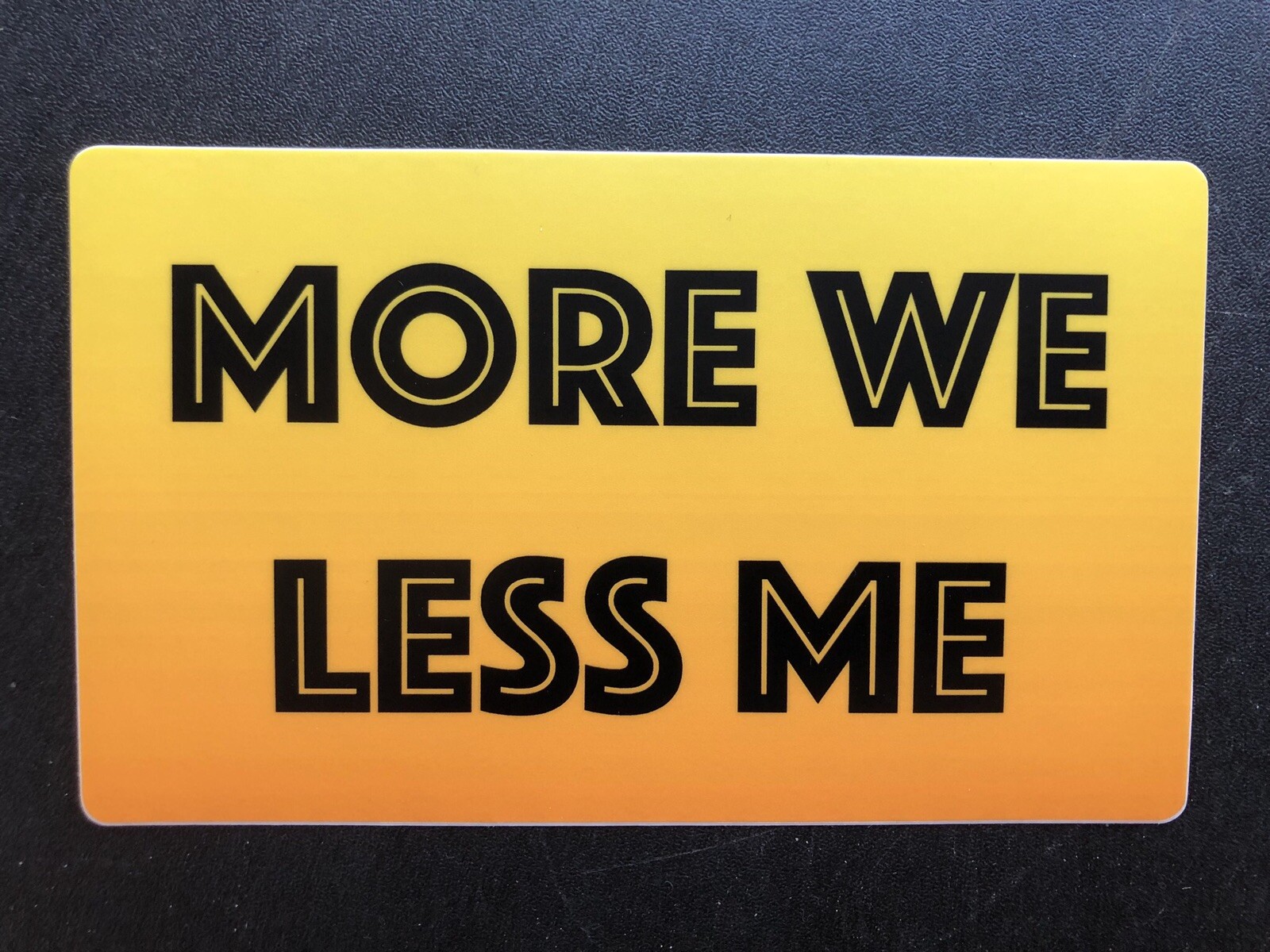 “More We, Less Me” Official Sticker