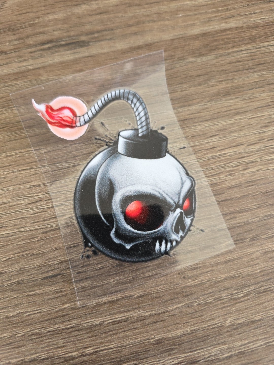 Skeleton Faced Ignited Bomb Cartoon UV DTF Decal Sticker Waterproof USA Printed