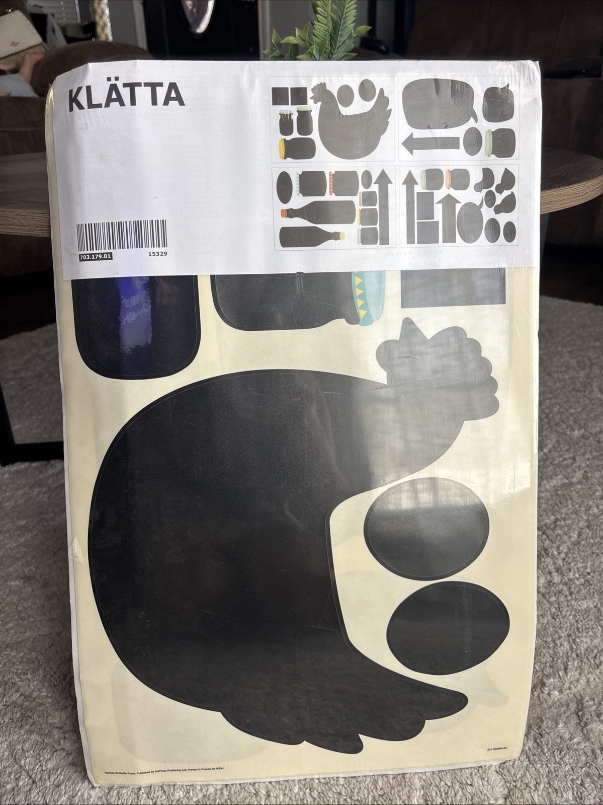 IKEA KLÄTTA wall stickers featuring black hen and bottle designs.