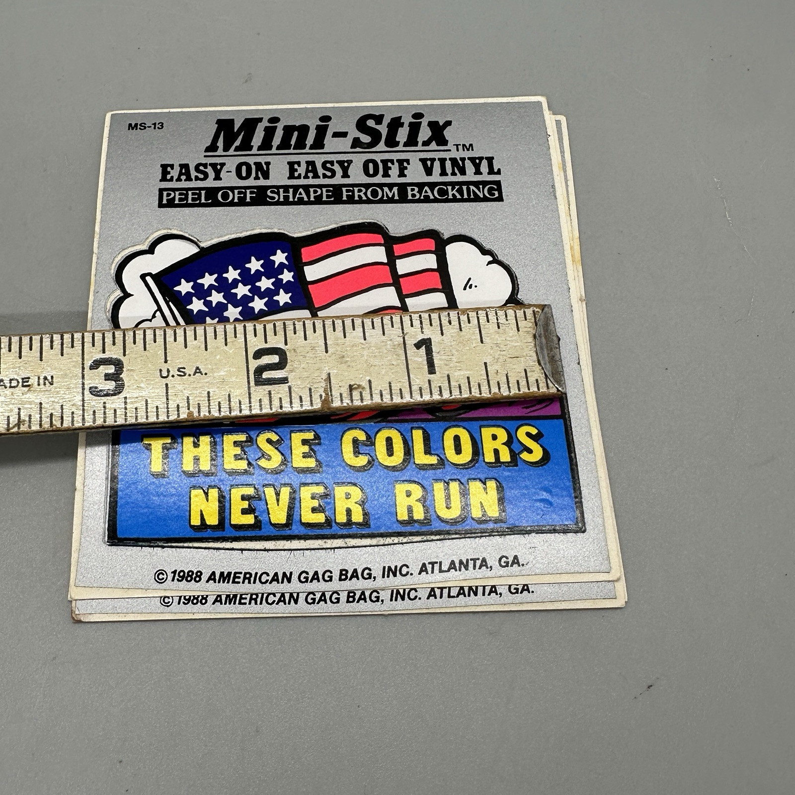 1988 Vintage "These Colors Never Run" US Flag Black Light Retro Vinyl Sticker