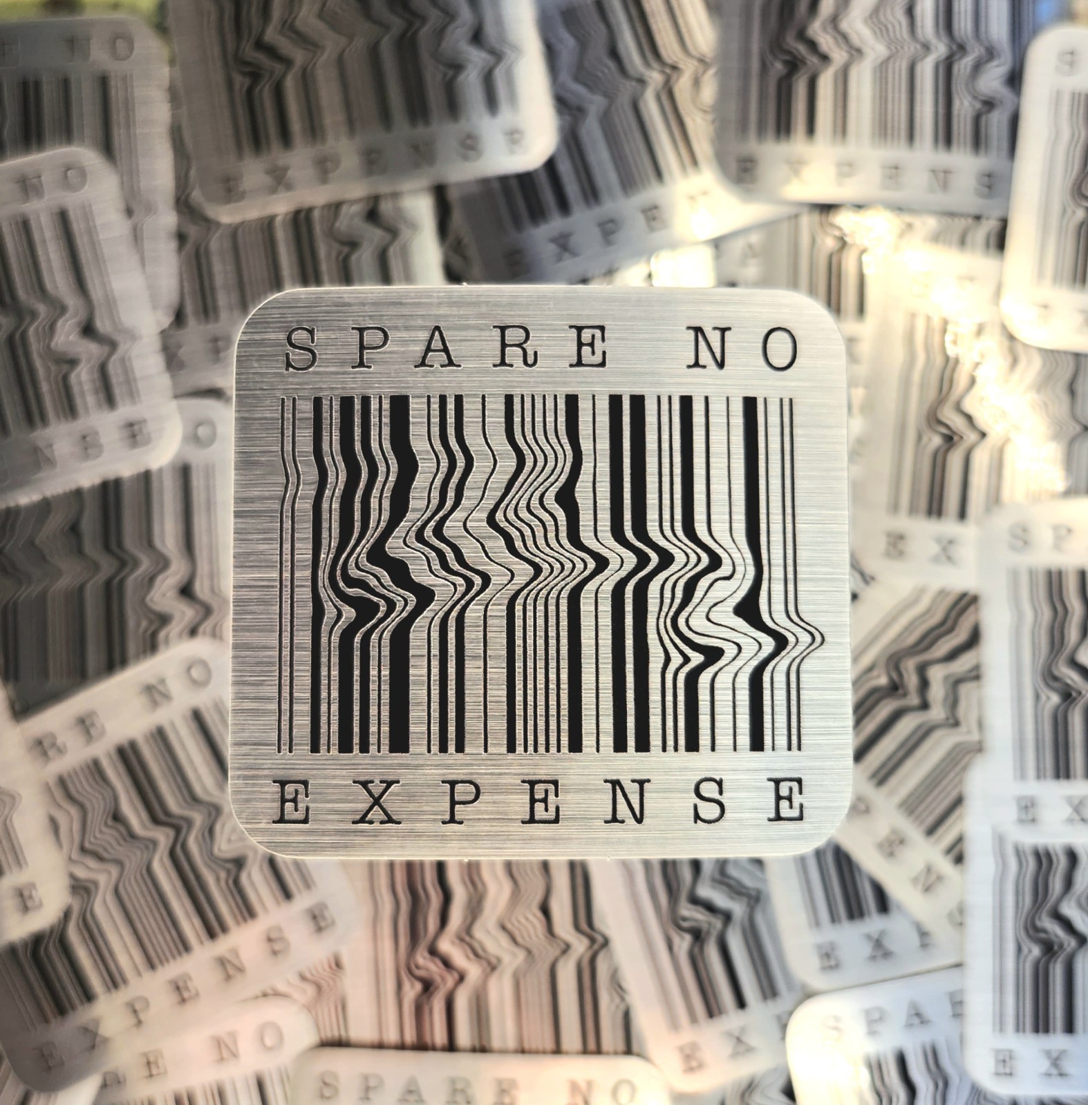 2.5 in. Jurassic Park Spare No Expense Brushed Aluminum Sticker