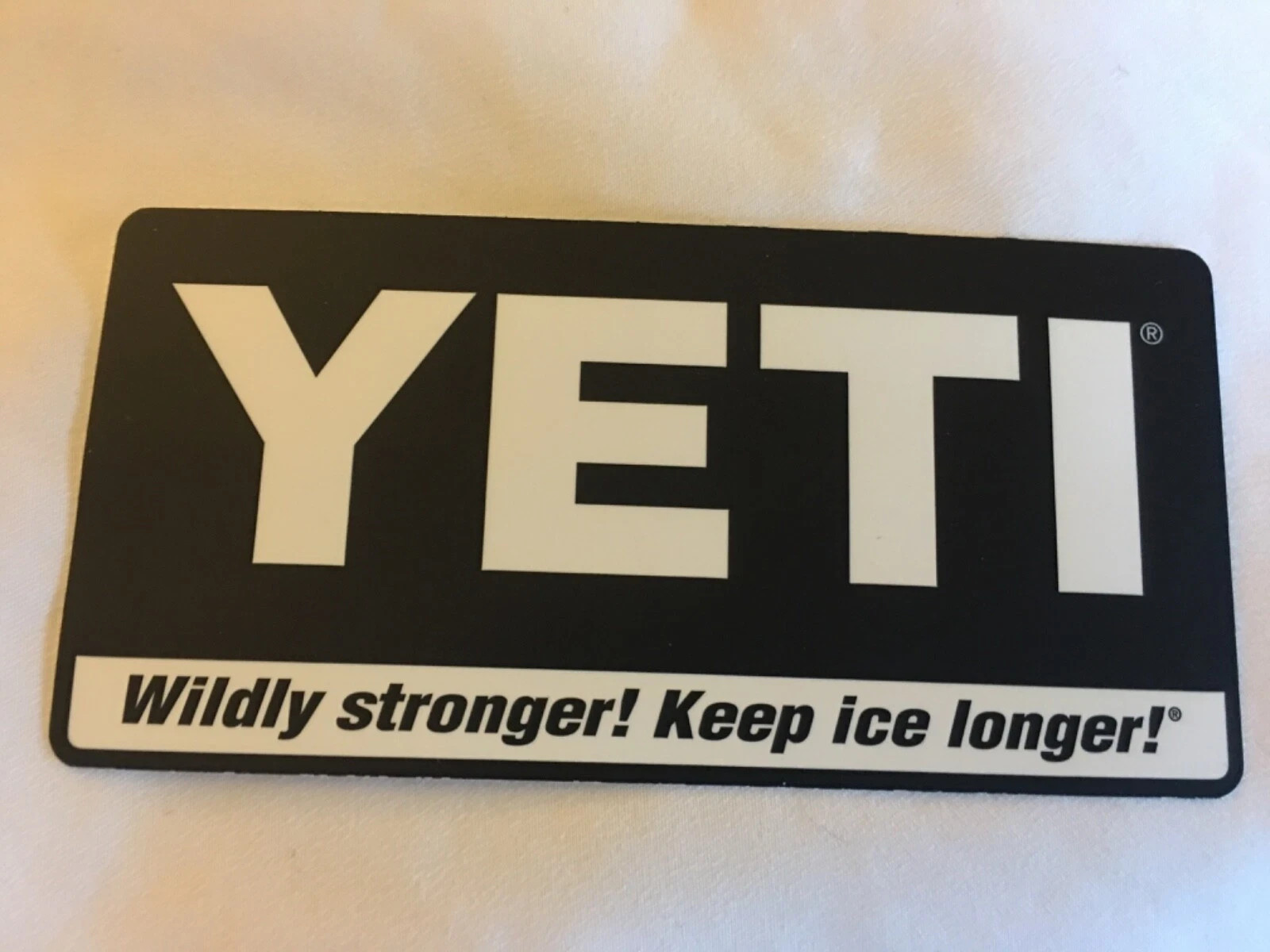 NEW YETI Wildly Stronger! Keep Ice Longer Logo Sticker Decal RARE Black Mug