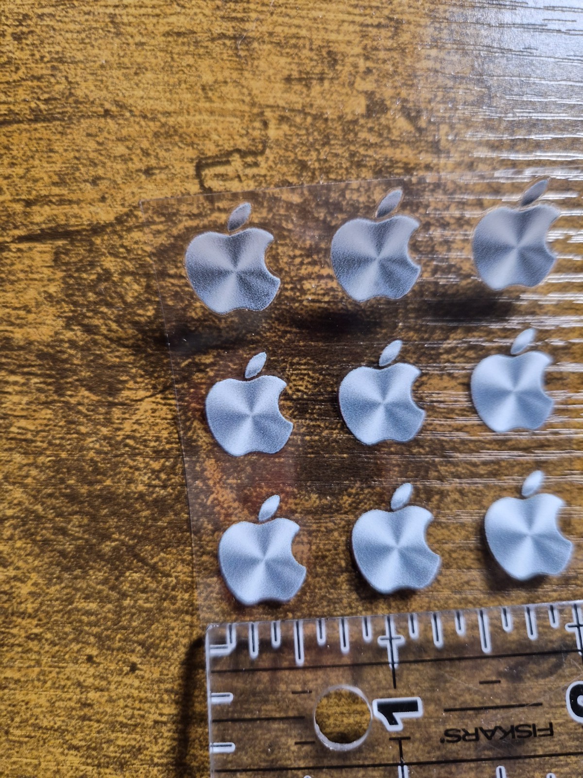 9 pc. Apple Logo Metallic Silver 5/8 in tall UV DTF Decal Sticker waterproof USA