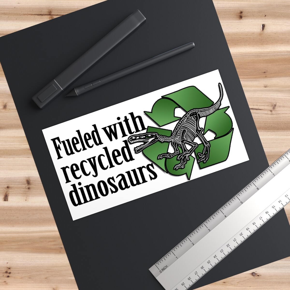 Recycled dinosaurs with a White premium water-resistant vinyl Bumper Sticker