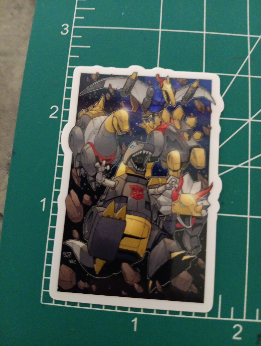 TRANSFORMERS STICKER X DINOBOTS