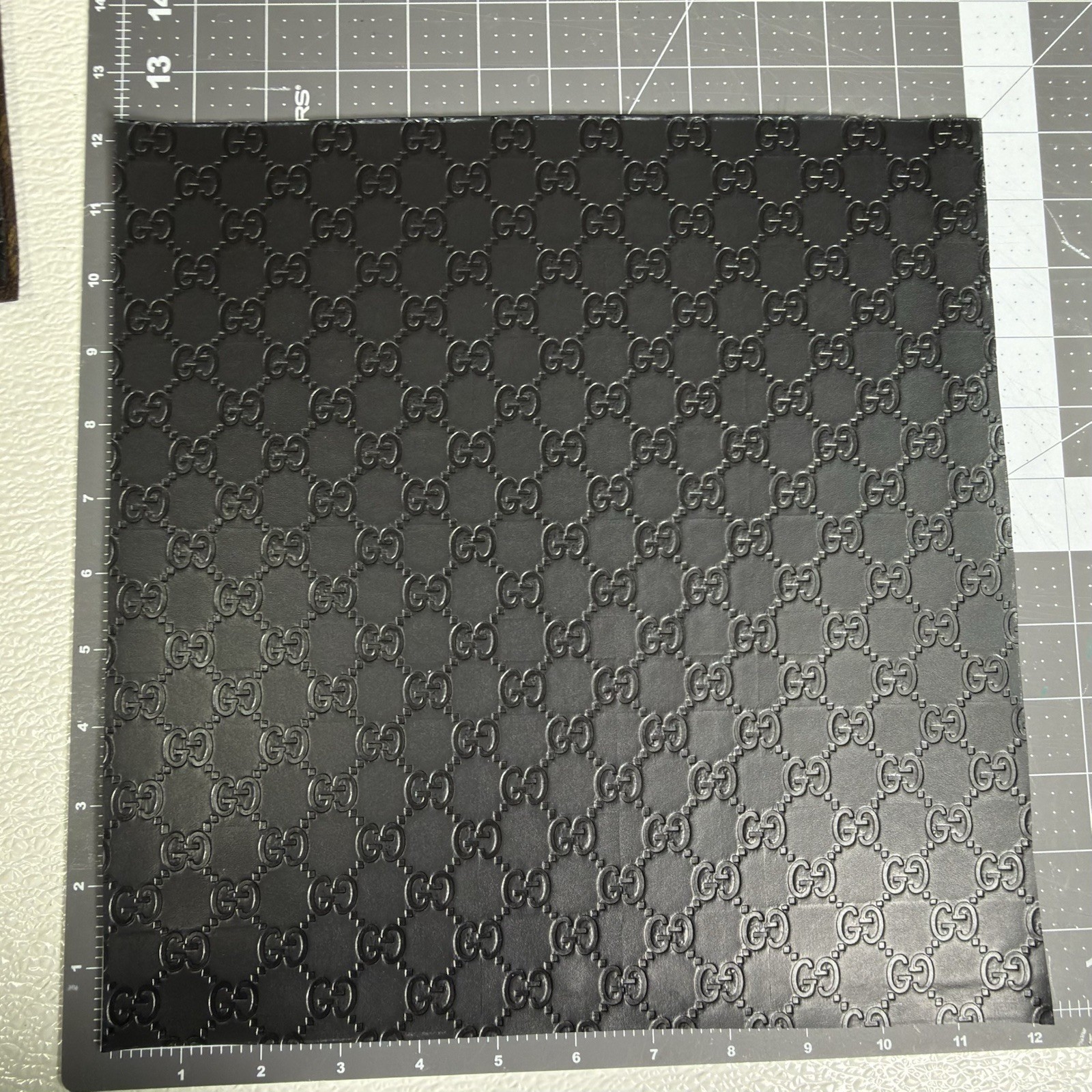 G.G. Black Embossed Monogram Vinyl For Crafting piece 12" X 12"