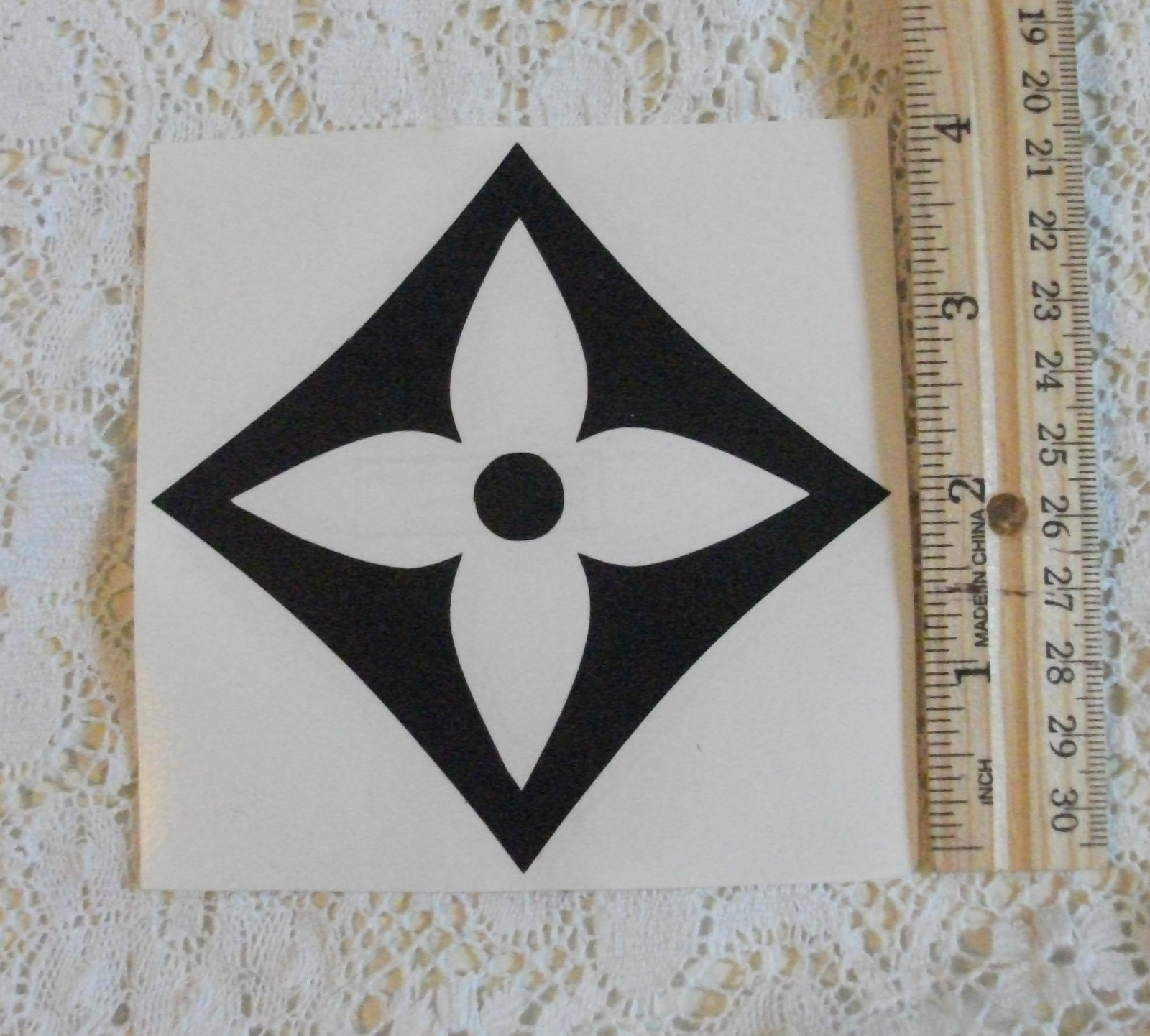 FLOWER DECAL black on clear 4" tall designer decorator Interior use