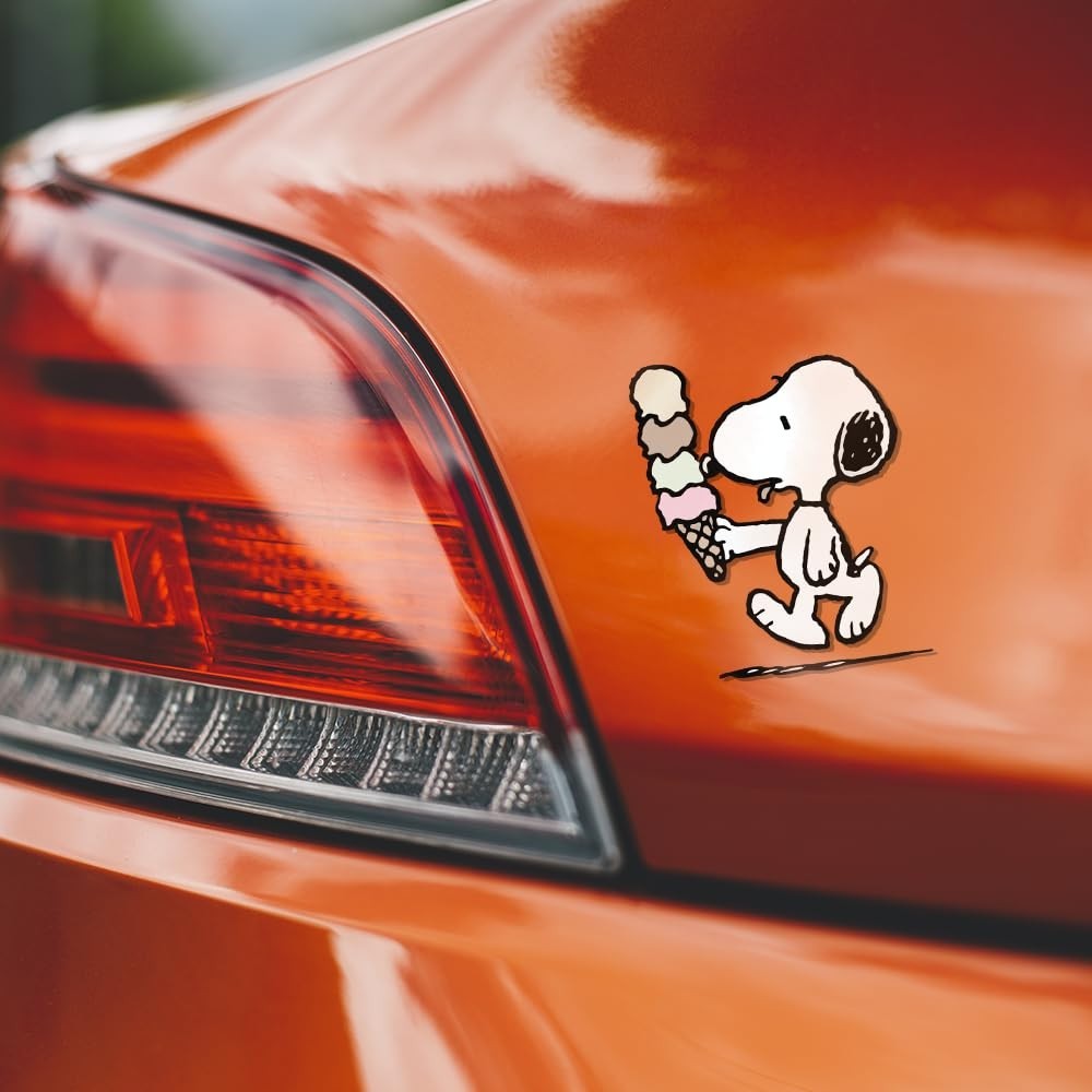 Peanuts Adorable and aesthetic sticker of Snoopy eating an ice cream 3"W x 4.5"H