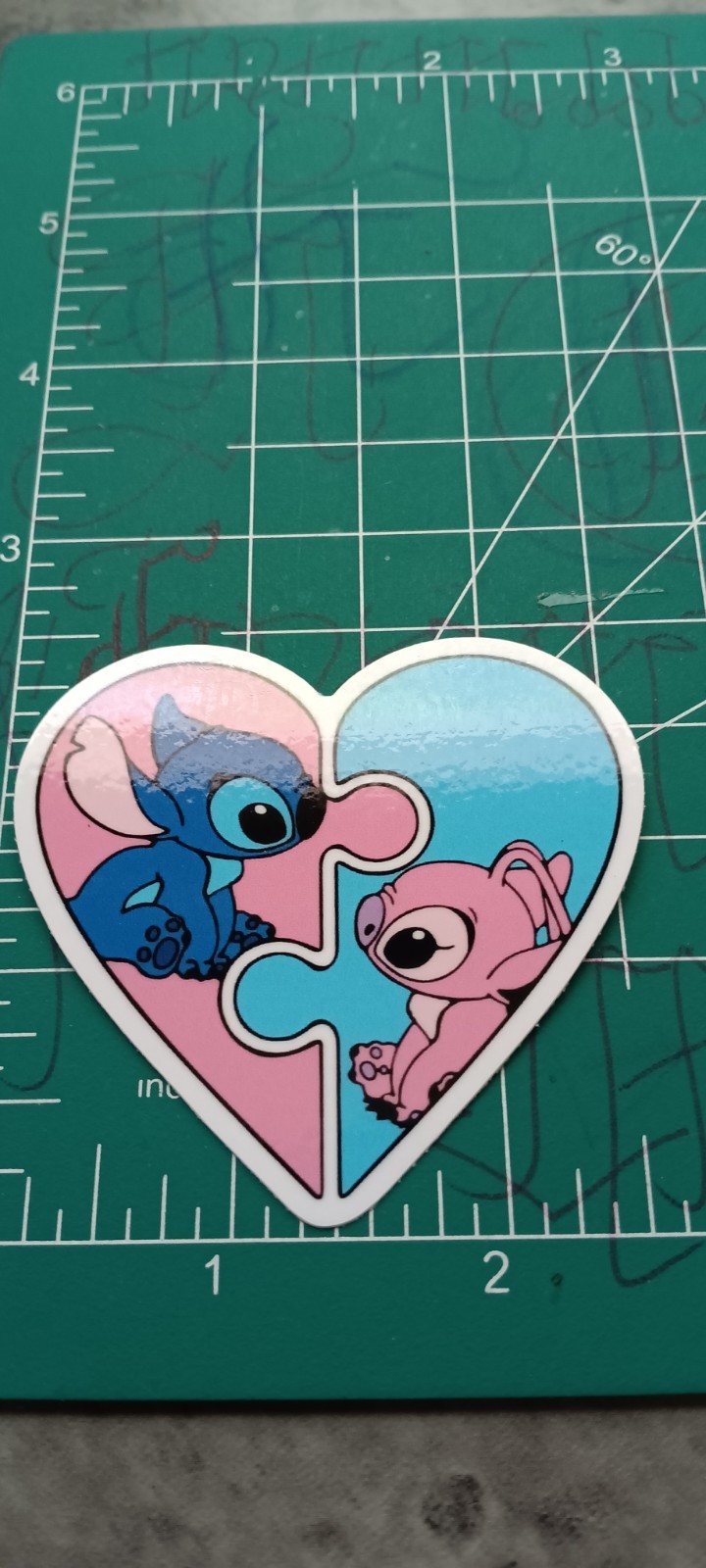 Stitch, a blue alien, and Angel, a pink alien VYNIL STICKER