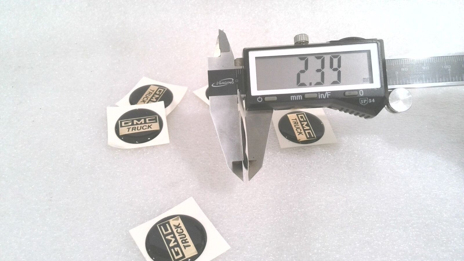 GMC TRUCK DOMED STICKER, BLACK/GOLD, 2 MM X 1.1" (LOT OF 18)