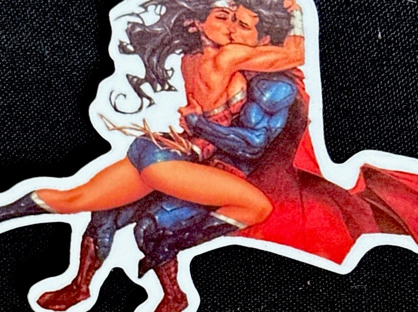 WONDER WOMAN & SUPERMAN STICKER✨❤️‍🔥⭐️💙✨3 1/2” x 2 1/2”✨LOVE IS IN THE AIR💫