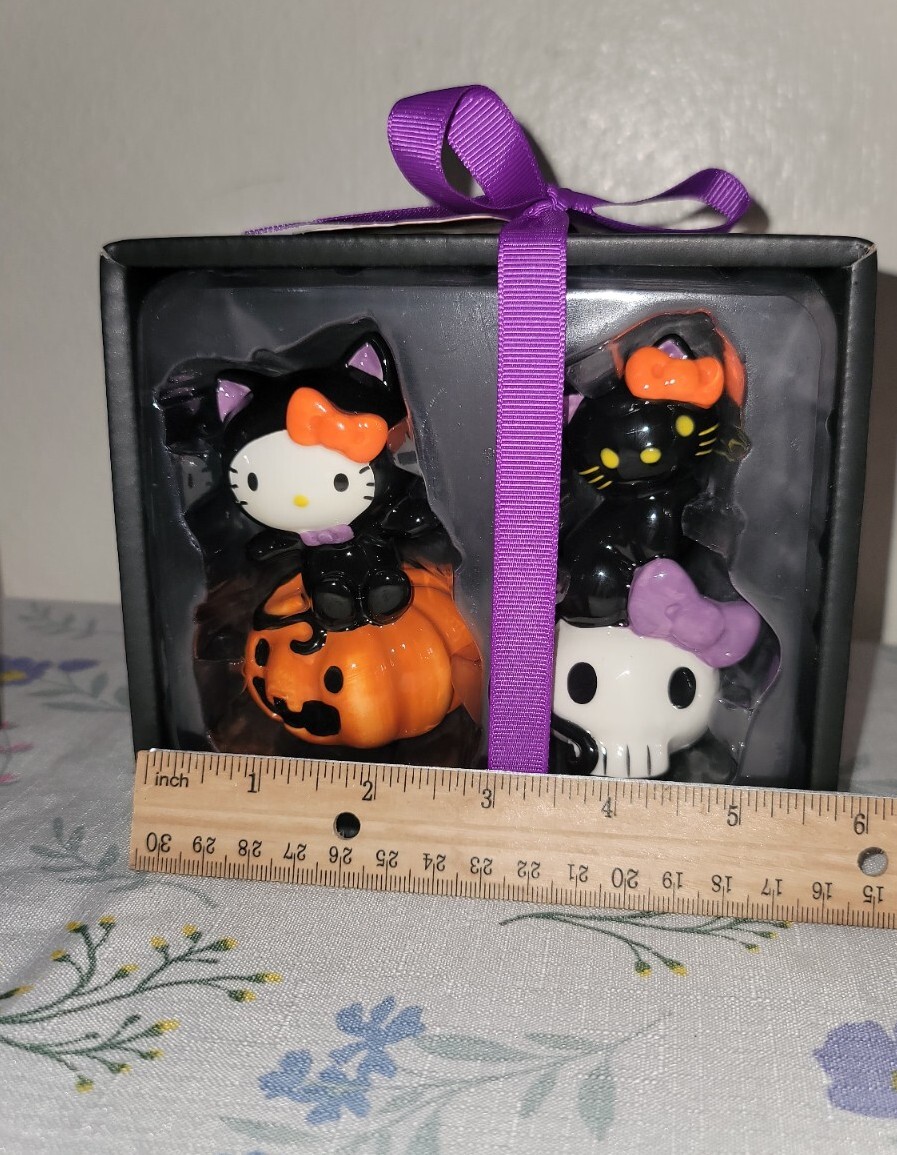 Halloween Blue Sky Clayworks Hello Kitty Cat Costume Salt and Pepper Shakers.