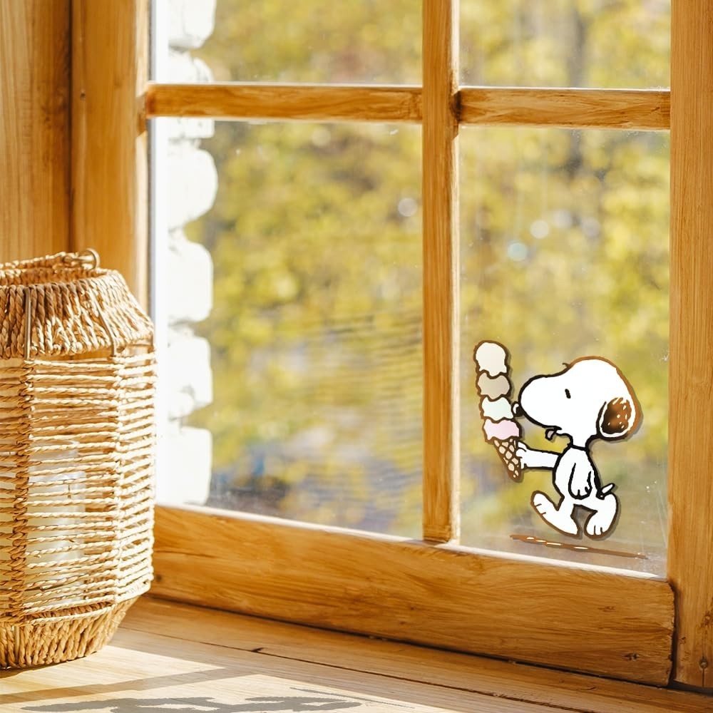 Peanuts Adorable and aesthetic sticker of Snoopy eating an ice cream 3"W x 4.5"H