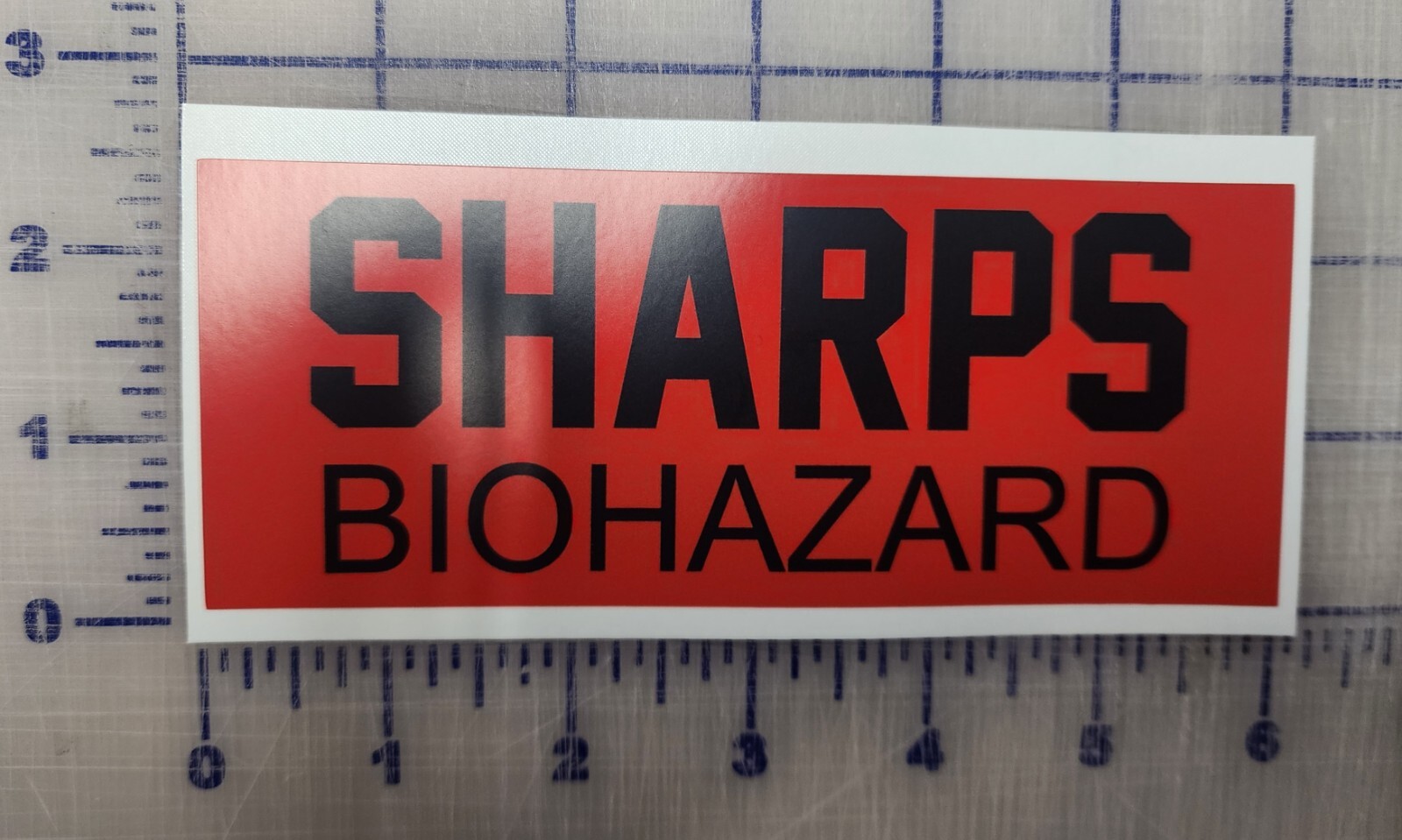 Sharps Biohazard vinyl sticker 6" long for container peel and stick
