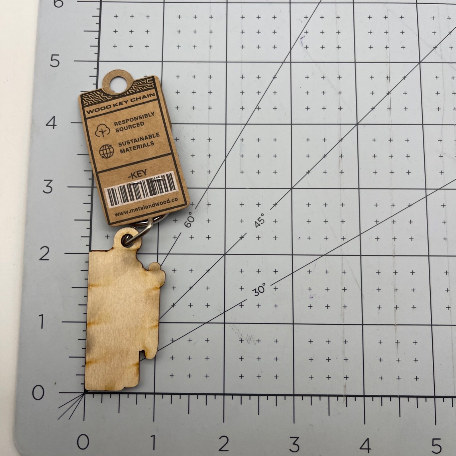 Metal and Wood Co Keychain Travel Tavernier Beach Surf Board on top of car