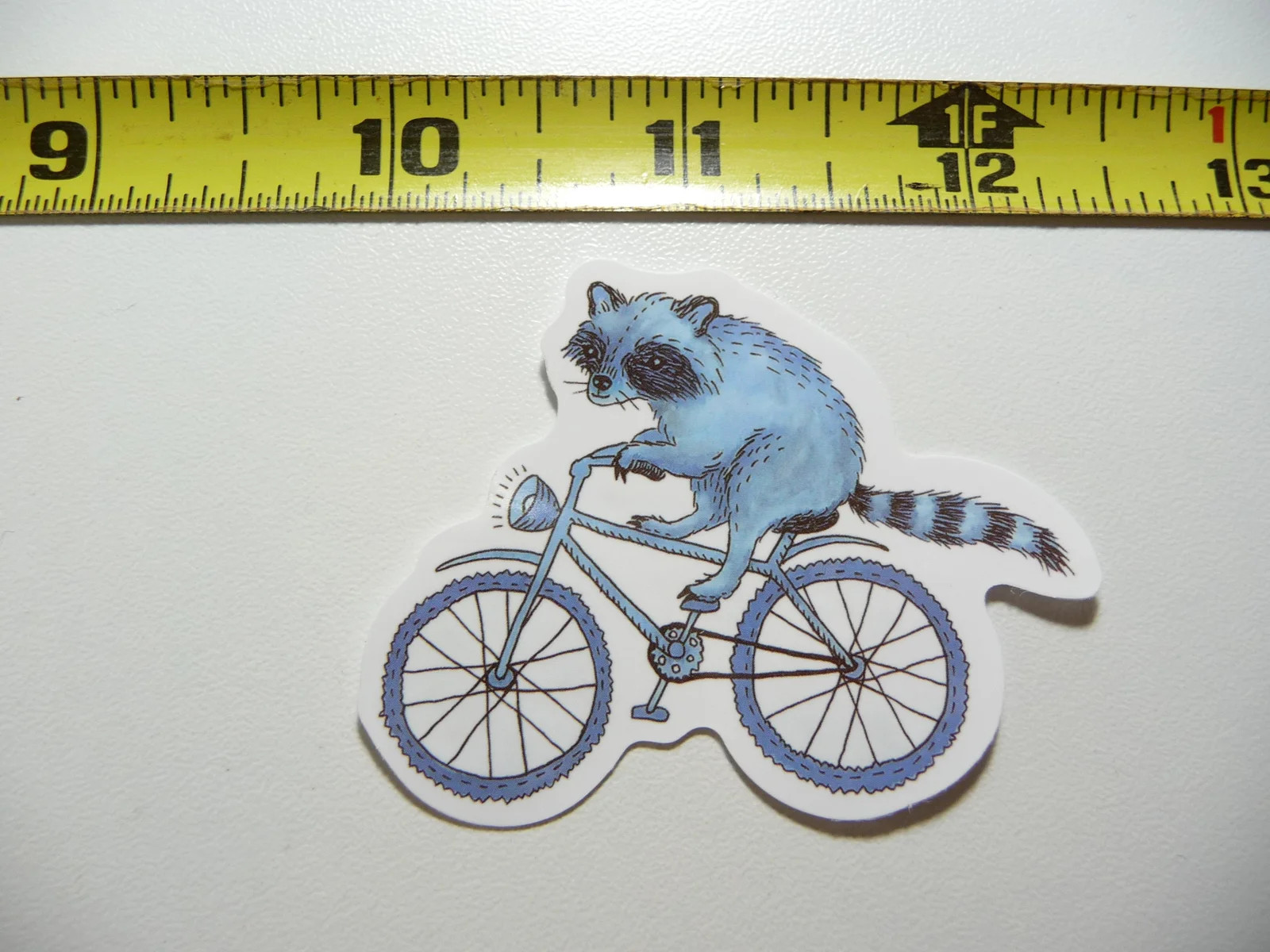 RACCOON RIDING BIKE BICYCLE SMALL STICKER DECAL WILD ANIMAL PET BANDIT MASKED