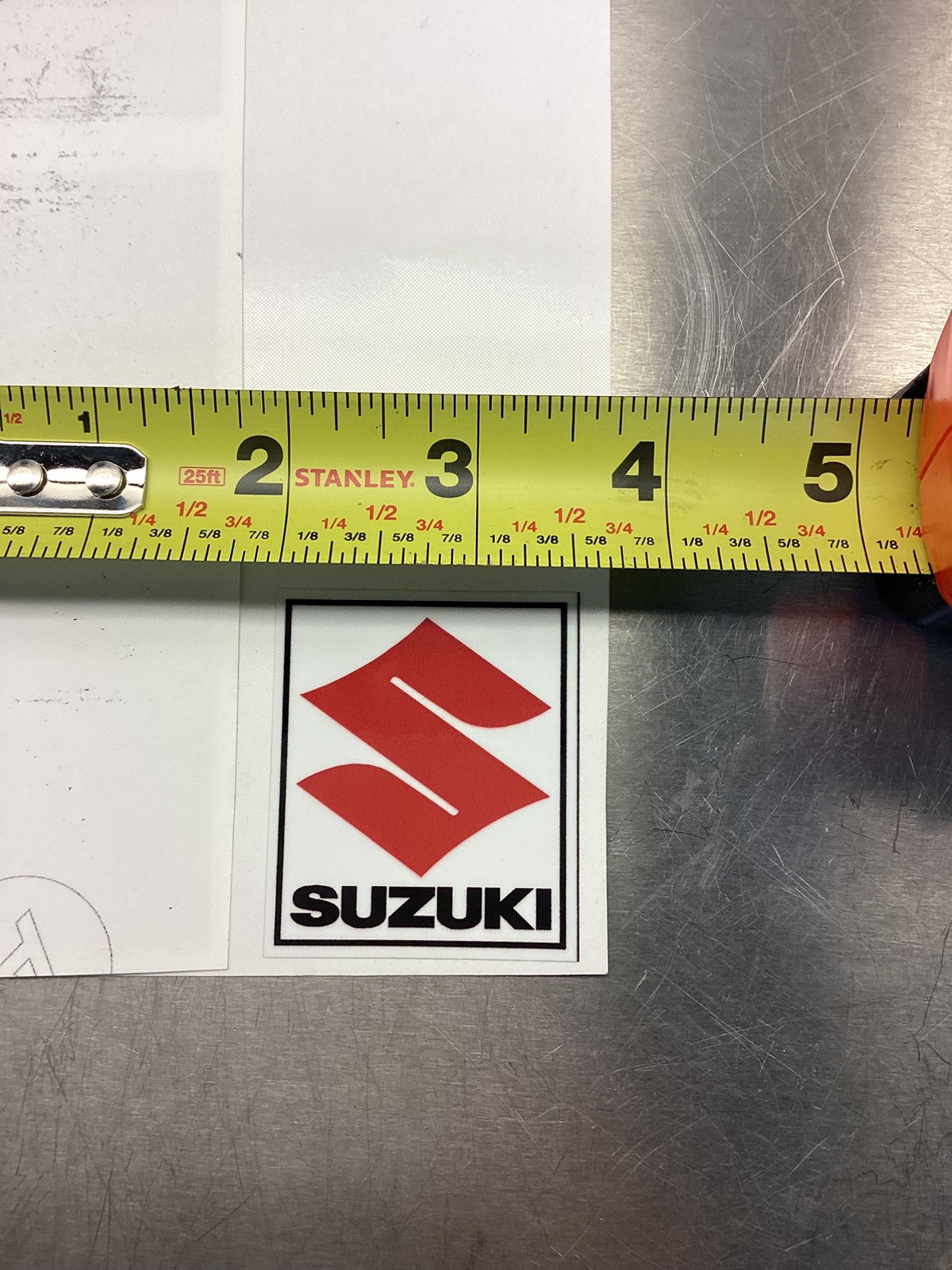 A Pair of Vintage Suzuki Red S Logo Decal Stickers 125 250 370 400