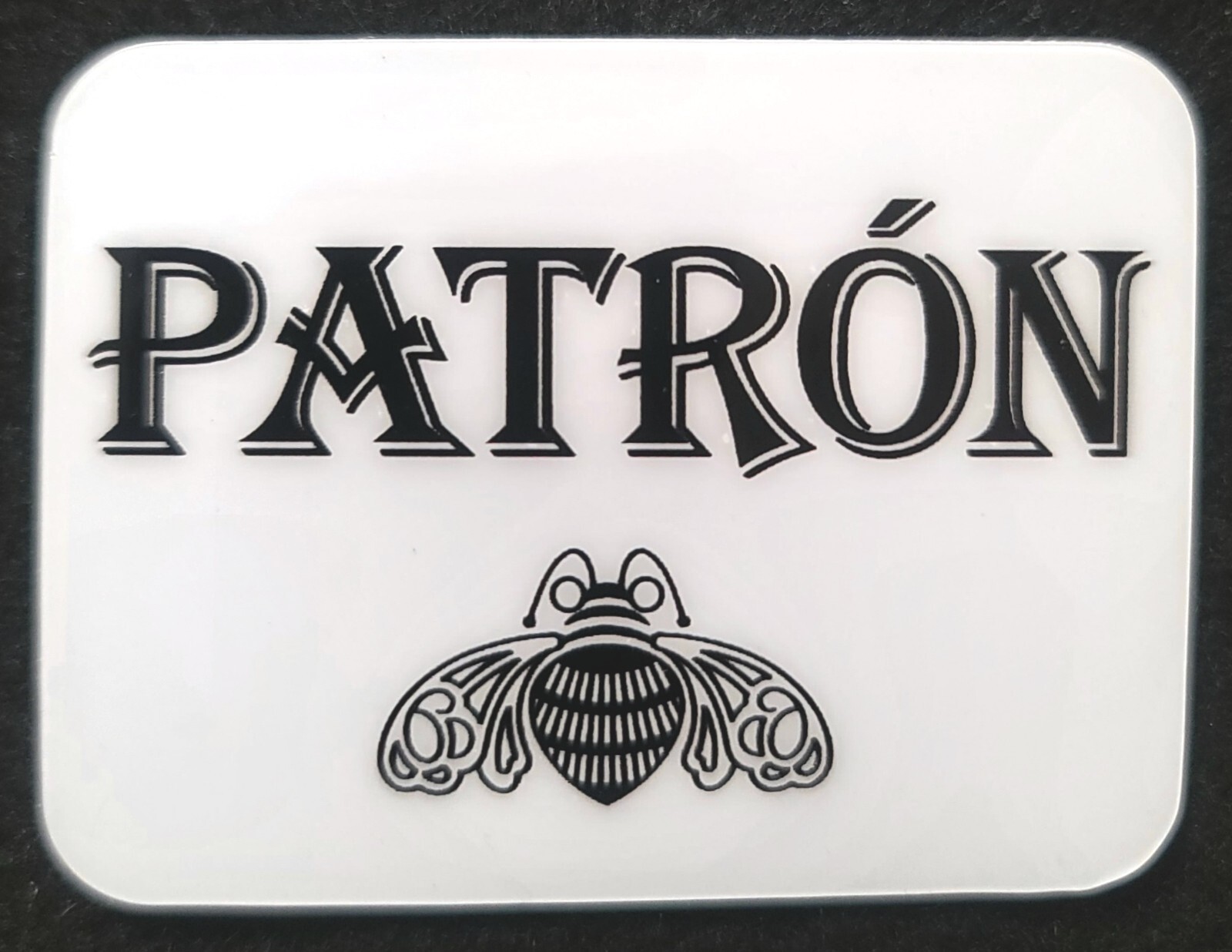PATRON STICKER "BLACK ON WHITE" 2 3/4 X 2 1/8" GLOSSY THICK WATERPROOF