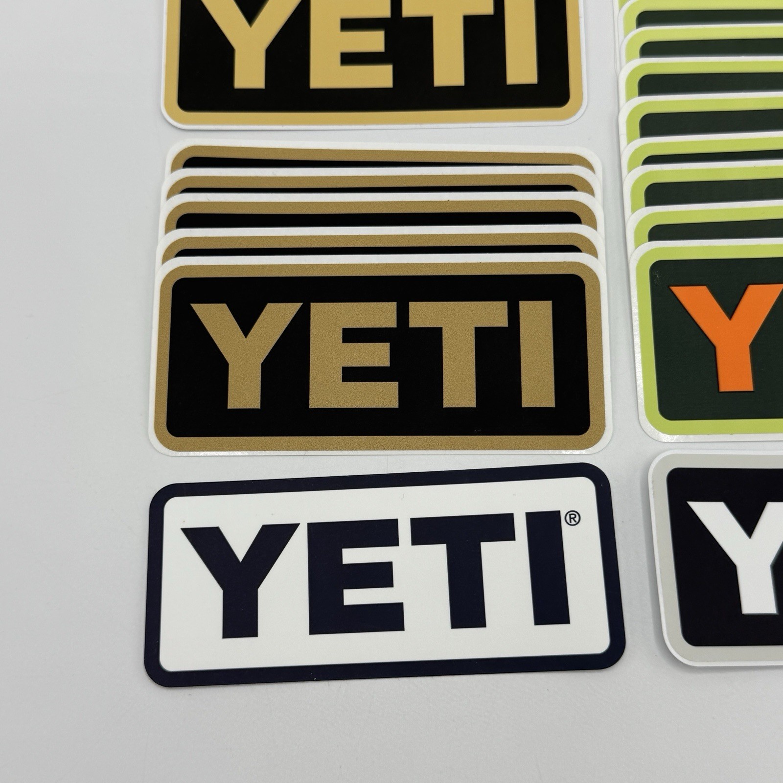 YETI Logo Stickers Decals Lot of 24 – Assorted Colors Tan Orange Black