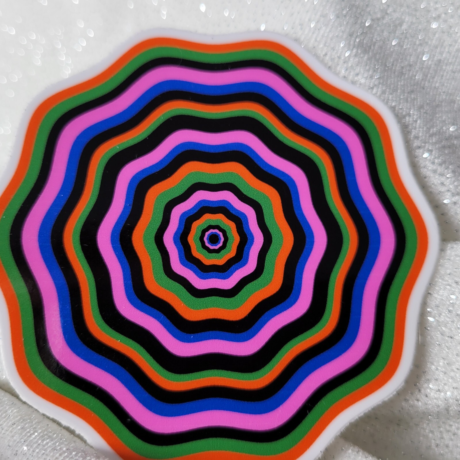 STKR084 Twisted Orange Green Pink Blue Seventies FLOWER Shaped Sticker Illusion
