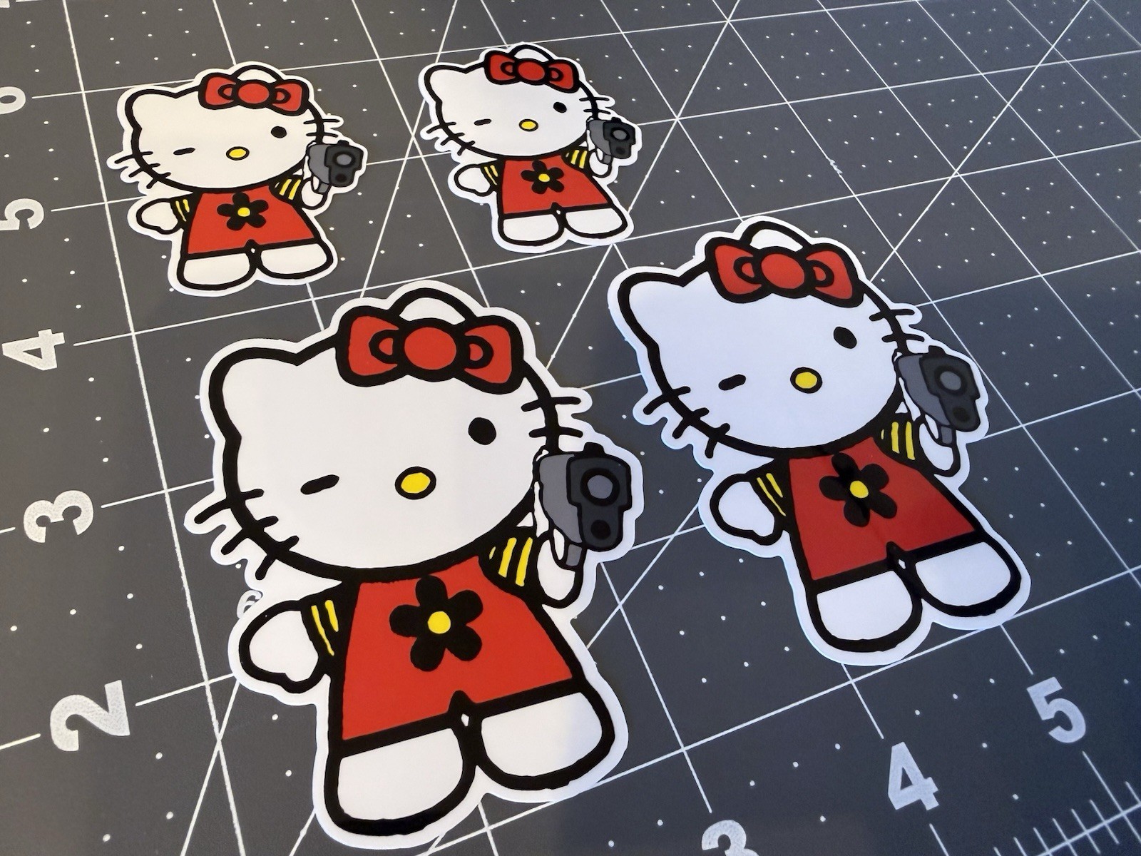 Hello Kitty Stickers Holding Gun Red 4 sticker Lot
