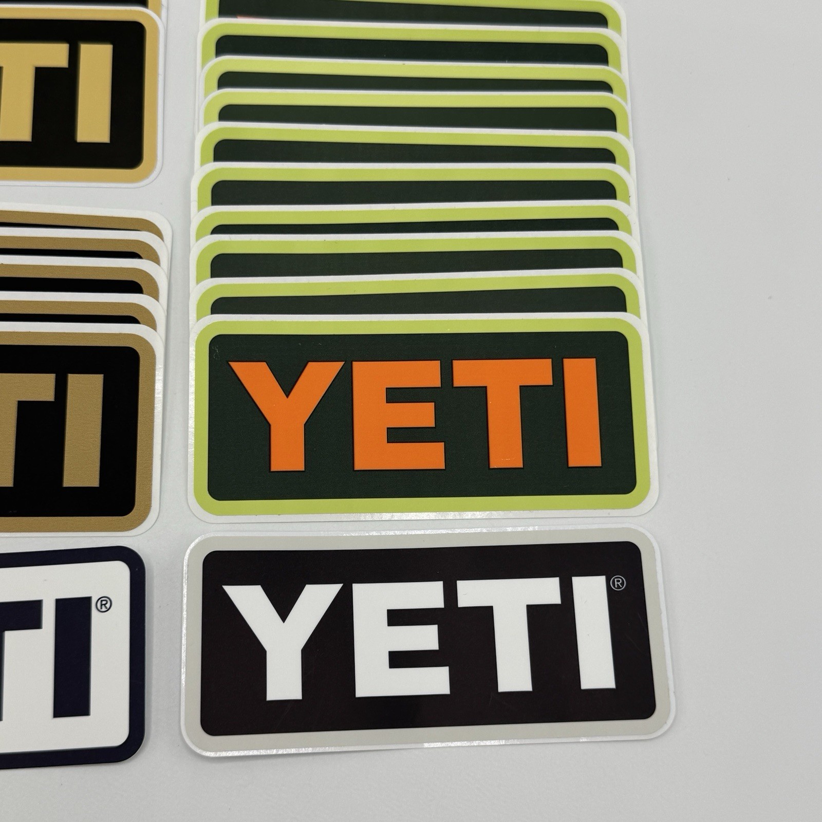YETI Logo Stickers Decals Lot of 24 – Assorted Colors Tan Orange Black