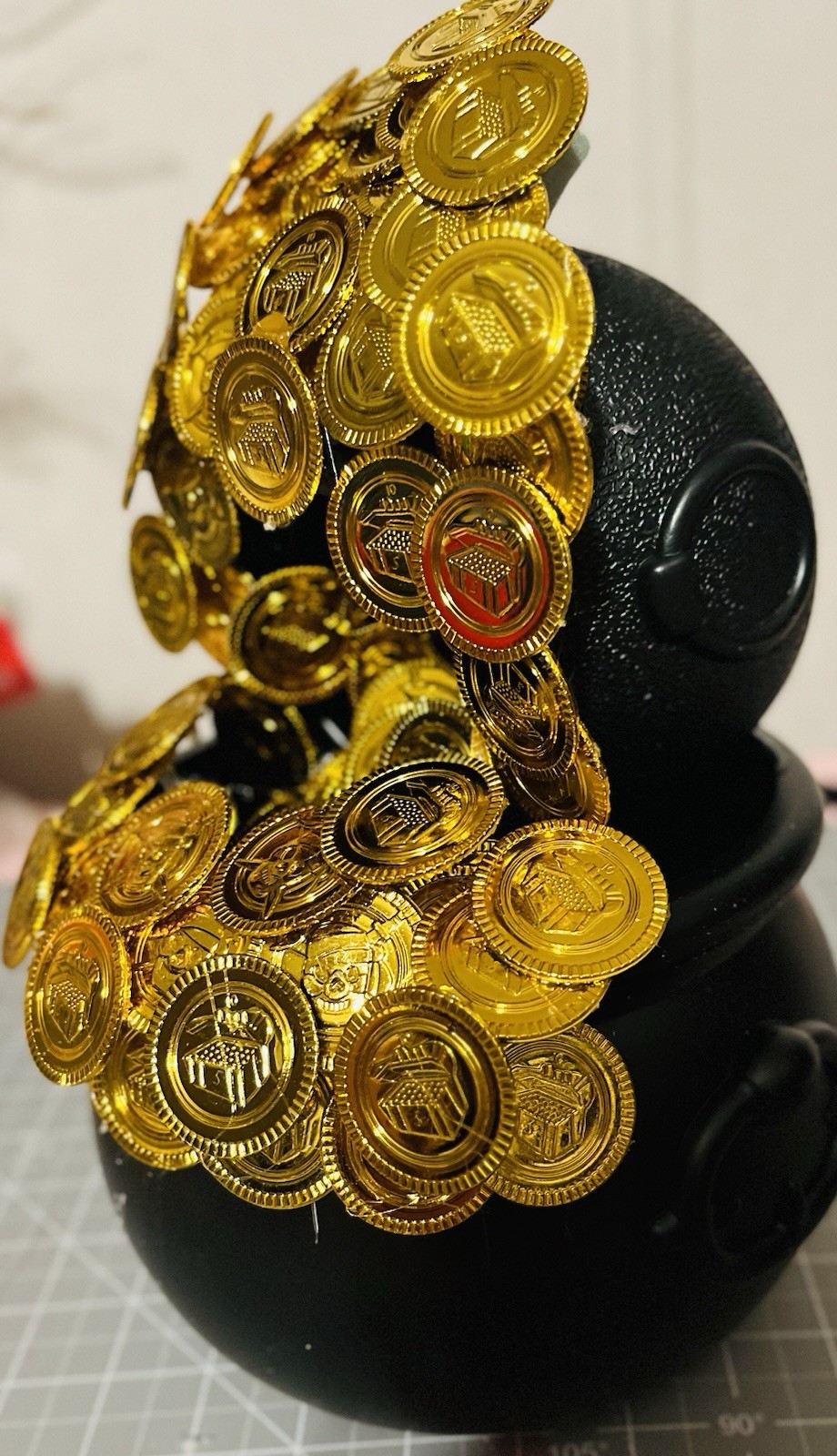 Plastic Gold Coins and Black Cauldron for Saint Patrick’s Day